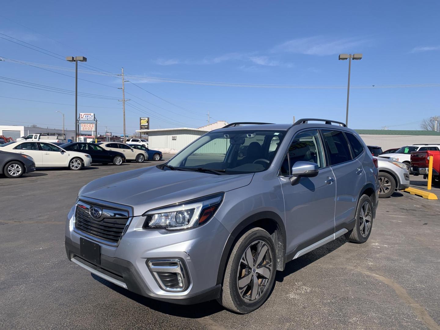 2019 SILVER /BLACK Subaru Forester Touring (JF2SKAWC0KH) with an 2.5L H4 SOHC 16V engine, CVT transmission, located at 506 S. Kingshighway, Cape Girardeau, MO, 63703, (573) 235-5000, 37.294991, -89.553635 - 2019 Subaru Forester Touring 37,xxx miles Alarm System Bluetooth Cruise Control Dual Power Front Seats Folding Rear Seat Hands Free Phone Heated Rear Seats Heated Seats Heated Steering Wheel Integrated Garage Door Opener Leather Seats Navigation System Power Driver's Seat Power Outle - Photo#2