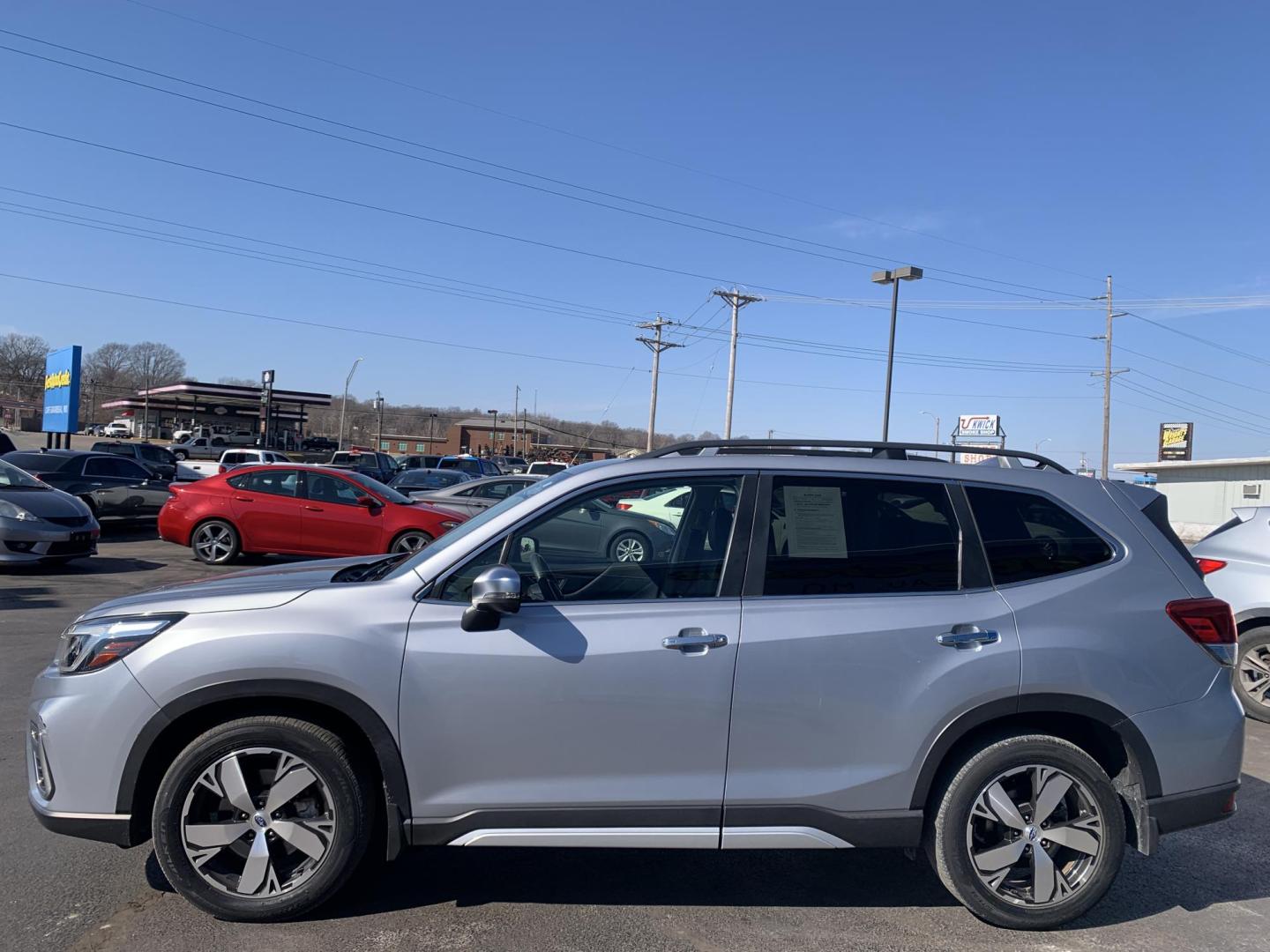 2019 SILVER /BLACK Subaru Forester Touring (JF2SKAWC0KH) with an 2.5L H4 SOHC 16V engine, CVT transmission, located at 506 S. Kingshighway, Cape Girardeau, MO, 63703, (573) 235-5000, 37.294991, -89.553635 - 2019 Subaru Forester Touring 37,xxx miles Alarm System Bluetooth Cruise Control Dual Power Front Seats Folding Rear Seat Hands Free Phone Heated Rear Seats Heated Seats Heated Steering Wheel Integrated Garage Door Opener Leather Seats Navigation System Power Driver's Seat Power Outle - Photo#3