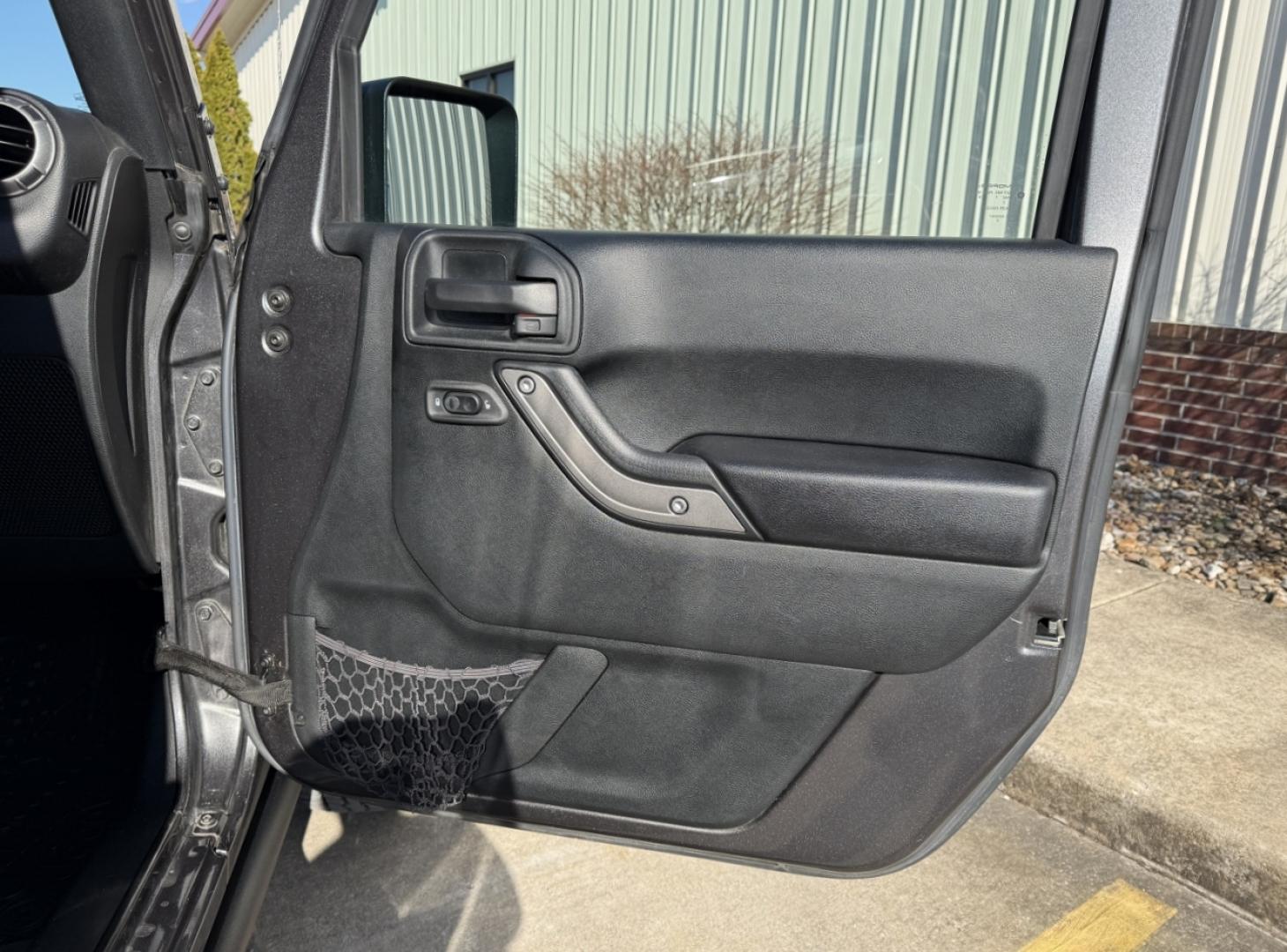 2018 GRAY /Black Jeep Wrangler Unlimited Sport 4WD (1C4BJWDG8JL) with an 3.6L V6 engine, Automatic transmission, located at 2990 Old Orchard Rd., Jackson, MO, 63755, 37.354214, -89.612106 - 2018 Jeep Wrangler Unlimited Sport 1-Owner 81xxx miles 4 Wheel Drive 3.6L V6 Automatic Heated Seats Bluetooth Remote Start Cruise Power Windows/Locks/Mirrors We have financing available and we accept trades! Fill out a credit application on our website or come by today! If you have any q - Photo#14