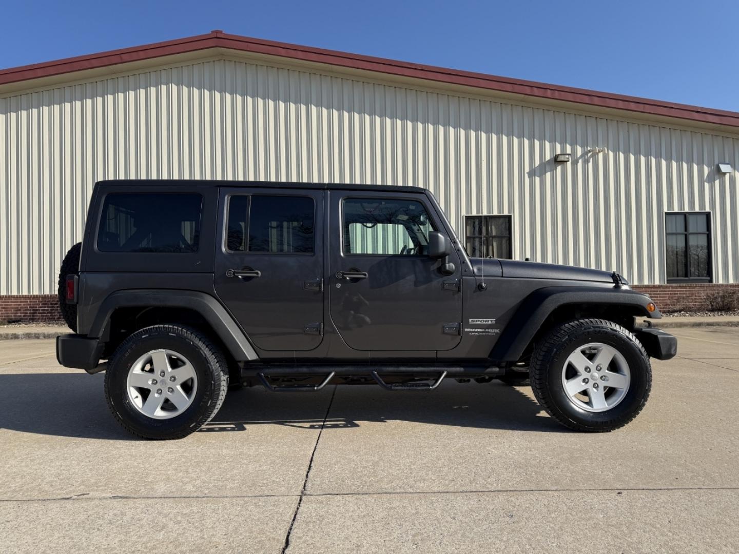 2018 GRAY /Black Jeep Wrangler Unlimited Sport 4WD (1C4BJWDG8JL) with an 3.6L V6 engine, Automatic transmission, located at 2990 Old Orchard Rd., Jackson, MO, 63755, 37.354214, -89.612106 - 2018 Jeep Wrangler Unlimited Sport 1-Owner 81xxx miles 4 Wheel Drive 3.6L V6 Automatic Heated Seats Bluetooth Remote Start Cruise Power Windows/Locks/Mirrors We have financing available and we accept trades! Fill out a credit application on our website or come by today! If you have any q - Photo#7