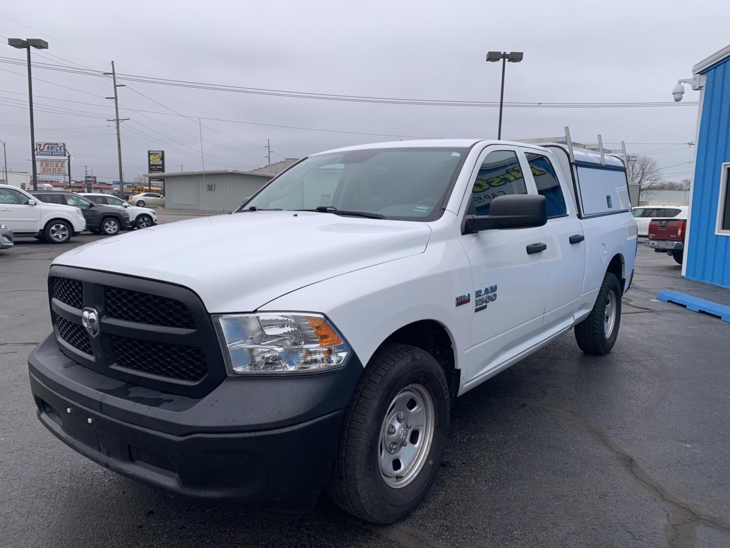 2019 WHITE /GRAY RAM 1500 Tradesman Quad Cab 4WD (1C6RR7FTXKS) with an 5.7L V8 OHV 16V engine, Automatic transmission, located at 506 S. Kingshighway, Cape Girardeau, MO, 63703, (573) 235-5000, 37.294991, -89.553635 - 2019 Ram 1500 Classic Only 66,xxx miles 4x4 Alarm System Cloth Seats Cruise Control Folding Rear Seat Power Outlet Power Windows Remote Keyless Entry Tilt Steering Wheel We have financing available and we accept trades! Fill out a credit application on our website or come by today! If - Photo#2