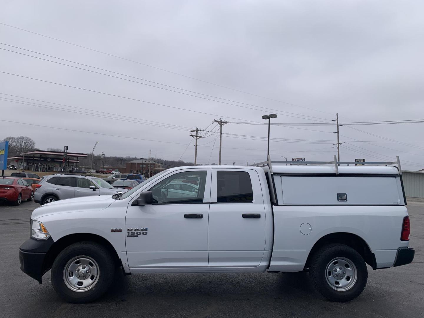 2019 WHITE /GRAY RAM 1500 Tradesman Quad Cab 4WD (1C6RR7FTXKS) with an 5.7L V8 OHV 16V engine, Automatic transmission, located at 506 S. Kingshighway, Cape Girardeau, MO, 63703, (573) 235-5000, 37.294991, -89.553635 - 2019 Ram 1500 Classic Only 66,xxx miles 4x4 Alarm System Cloth Seats Cruise Control Folding Rear Seat Power Outlet Power Windows Remote Keyless Entry Tilt Steering Wheel We have financing available and we accept trades! Fill out a credit application on our website or come by today! If - Photo#3