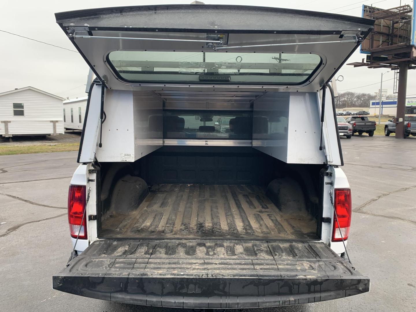 2019 WHITE /GRAY RAM 1500 Tradesman Quad Cab 4WD (1C6RR7FTXKS) with an 5.7L V8 OHV 16V engine, Automatic transmission, located at 506 S. Kingshighway, Cape Girardeau, MO, 63703, (573) 235-5000, 37.294991, -89.553635 - 2019 Ram 1500 Classic Only 66,xxx miles 4x4 Alarm System Cloth Seats Cruise Control Folding Rear Seat Power Outlet Power Windows Remote Keyless Entry Tilt Steering Wheel We have financing available and we accept trades! Fill out a credit application on our website or come by today! If - Photo#6