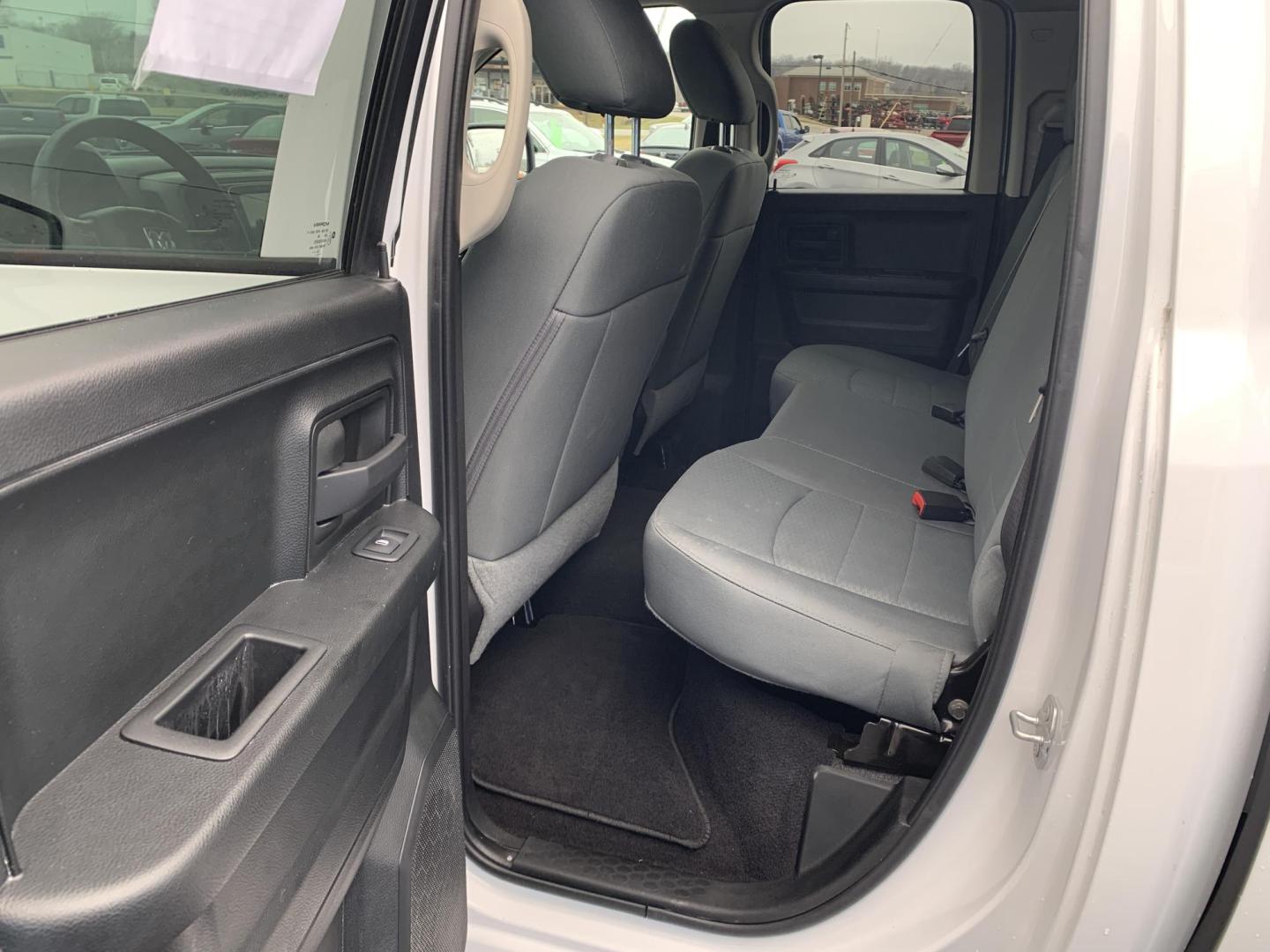 2019 WHITE /GRAY RAM 1500 Tradesman Quad Cab 4WD (1C6RR7FTXKS) with an 5.7L V8 OHV 16V engine, Automatic transmission, located at 506 S. Kingshighway, Cape Girardeau, MO, 63703, (573) 235-5000, 37.294991, -89.553635 - 2019 Ram 1500 Classic Only 66,xxx miles 4x4 Alarm System Cloth Seats Cruise Control Folding Rear Seat Power Outlet Power Windows Remote Keyless Entry Tilt Steering Wheel We have financing available and we accept trades! Fill out a credit application on our website or come by today! If - Photo#14