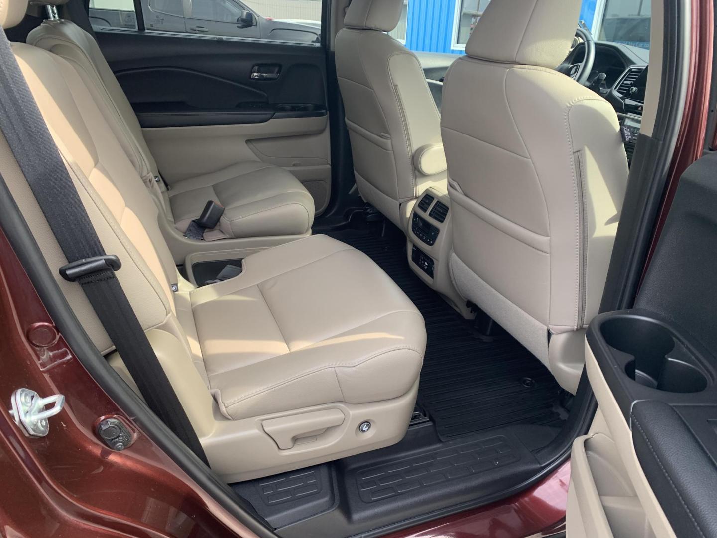 2021 MAROON /TAN Honda Pilot Touring AWD w/Rear Captains Chairs (5FNYF6H69MB) with an 3.5L V6 SOHC 24V engine, Automatic transmission, located at 506 S. Kingshighway, Cape Girardeau, MO, 63703, (573) 235-5000, 37.294991, -89.553635 - 2021 Honda Pilot Touring 88,xxx miles Rear Entertainment All Wheel Drive Cruise Bluetooth Keyless entry Push Button Start Back-up Camera Power Seats Heated Seats We have financing available and we accept trades! Fill out a credit application on our website or come by today! If you ha - Photo#11