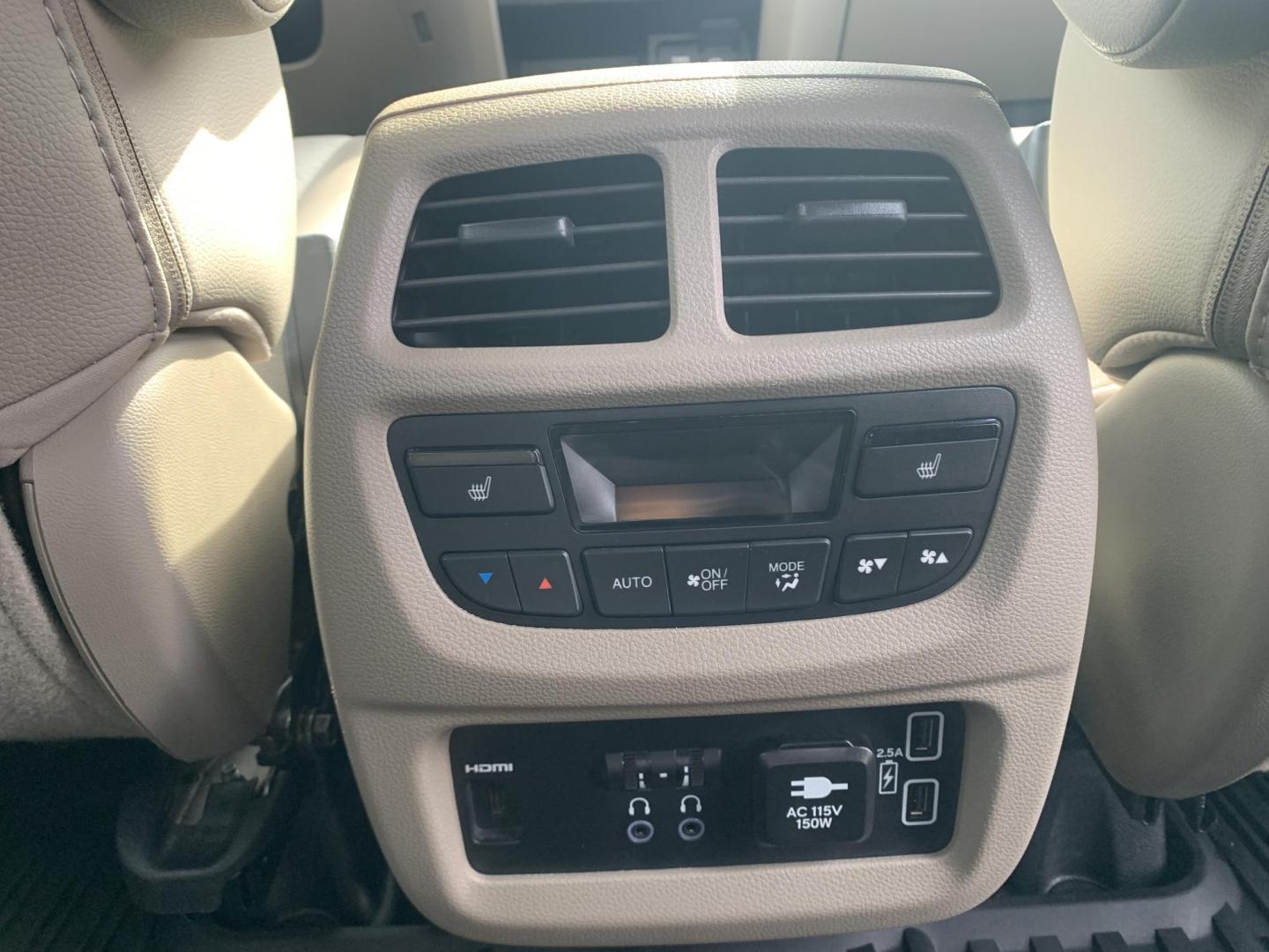 2021 MAROON /TAN Honda Pilot Touring AWD w/Rear Captains Chairs (5FNYF6H69MB) with an 3.5L V6 SOHC 24V engine, Automatic transmission, located at 506 S. Kingshighway, Cape Girardeau, MO, 63703, (573) 235-5000, 37.294991, -89.553635 - 2021 Honda Pilot Touring 88,xxx miles Rear Entertainment All Wheel Drive Cruise Bluetooth Keyless entry Push Button Start Back-up Camera Power Seats Heated Seats We have financing available and we accept trades! Fill out a credit application on our website or come by today! If you ha - Photo#12