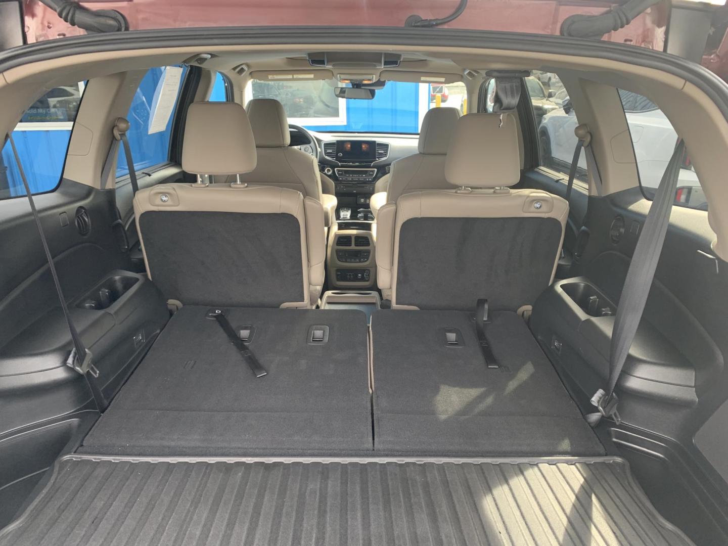 2021 MAROON /TAN Honda Pilot Touring AWD w/Rear Captains Chairs (5FNYF6H69MB) with an 3.5L V6 SOHC 24V engine, Automatic transmission, located at 506 S. Kingshighway, Cape Girardeau, MO, 63703, (573) 235-5000, 37.294991, -89.553635 - 2021 Honda Pilot Touring 88,xxx miles Rear Entertainment All Wheel Drive Cruise Bluetooth Keyless entry Push Button Start Back-up Camera Power Seats Heated Seats We have financing available and we accept trades! Fill out a credit application on our website or come by today! If you ha - Photo#15