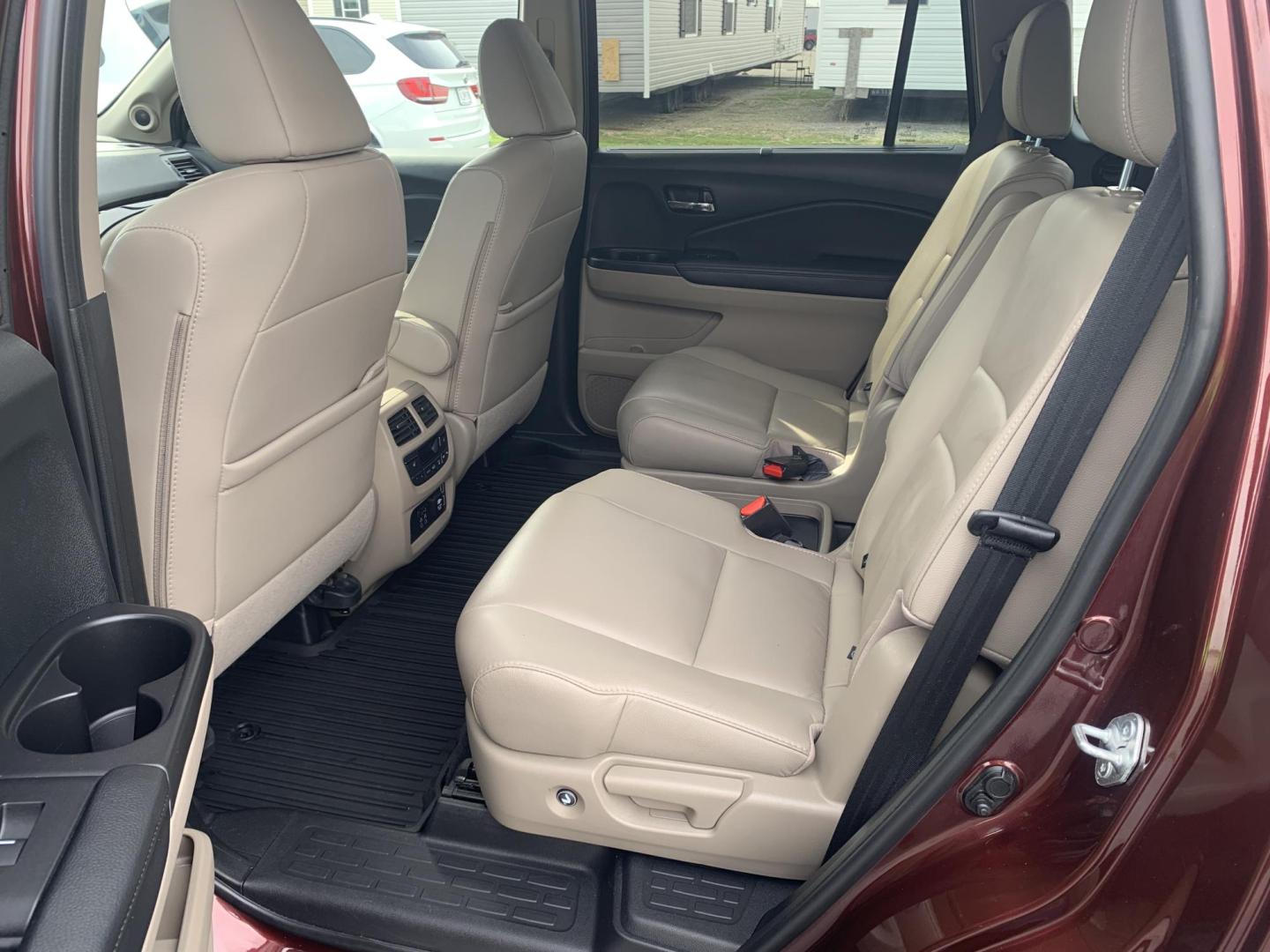 2021 MAROON /TAN Honda Pilot Touring AWD w/Rear Captains Chairs (5FNYF6H69MB) with an 3.5L V6 SOHC 24V engine, Automatic transmission, located at 506 S. Kingshighway, Cape Girardeau, MO, 63703, (573) 235-5000, 37.294991, -89.553635 - 2021 Honda Pilot Touring 88,xxx miles Rear Entertainment All Wheel Drive Cruise Bluetooth Keyless entry Push Button Start Back-up Camera Power Seats Heated Seats We have financing available and we accept trades! Fill out a credit application on our website or come by today! If you ha - Photo#17