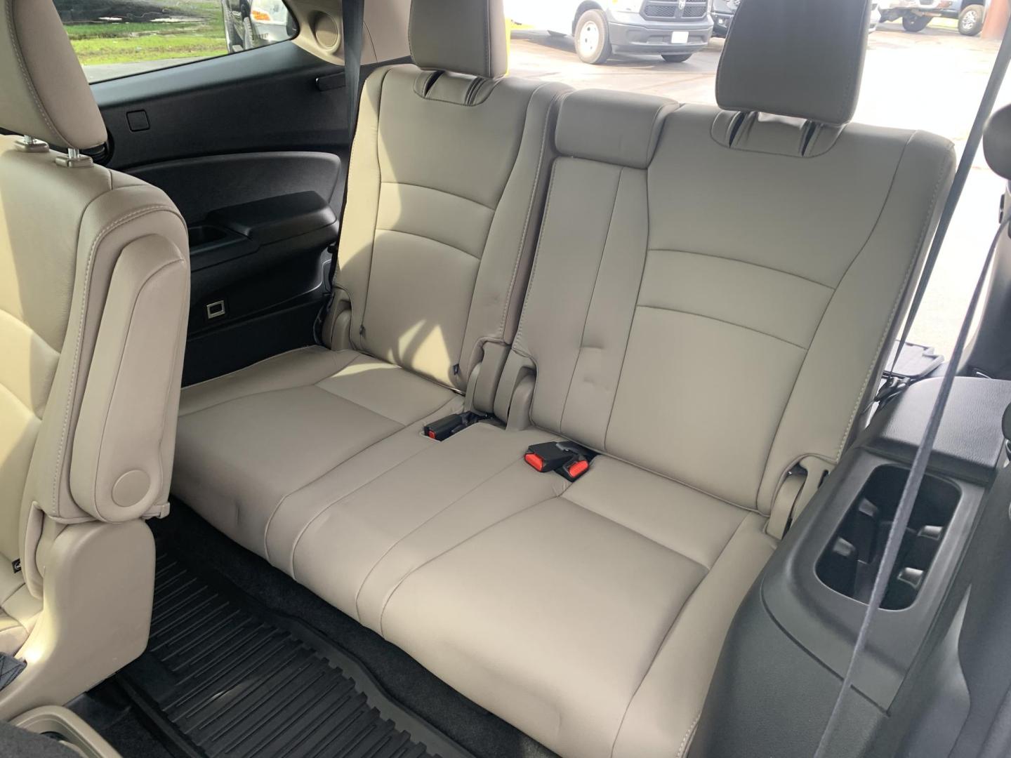 2021 MAROON /TAN Honda Pilot Touring AWD w/Rear Captains Chairs (5FNYF6H69MB) with an 3.5L V6 SOHC 24V engine, Automatic transmission, located at 506 S. Kingshighway, Cape Girardeau, MO, 63703, (573) 235-5000, 37.294991, -89.553635 - 2021 Honda Pilot Touring 88,xxx miles Rear Entertainment All Wheel Drive Cruise Bluetooth Keyless entry Push Button Start Back-up Camera Power Seats Heated Seats We have financing available and we accept trades! Fill out a credit application on our website or come by today! If you ha - Photo#27