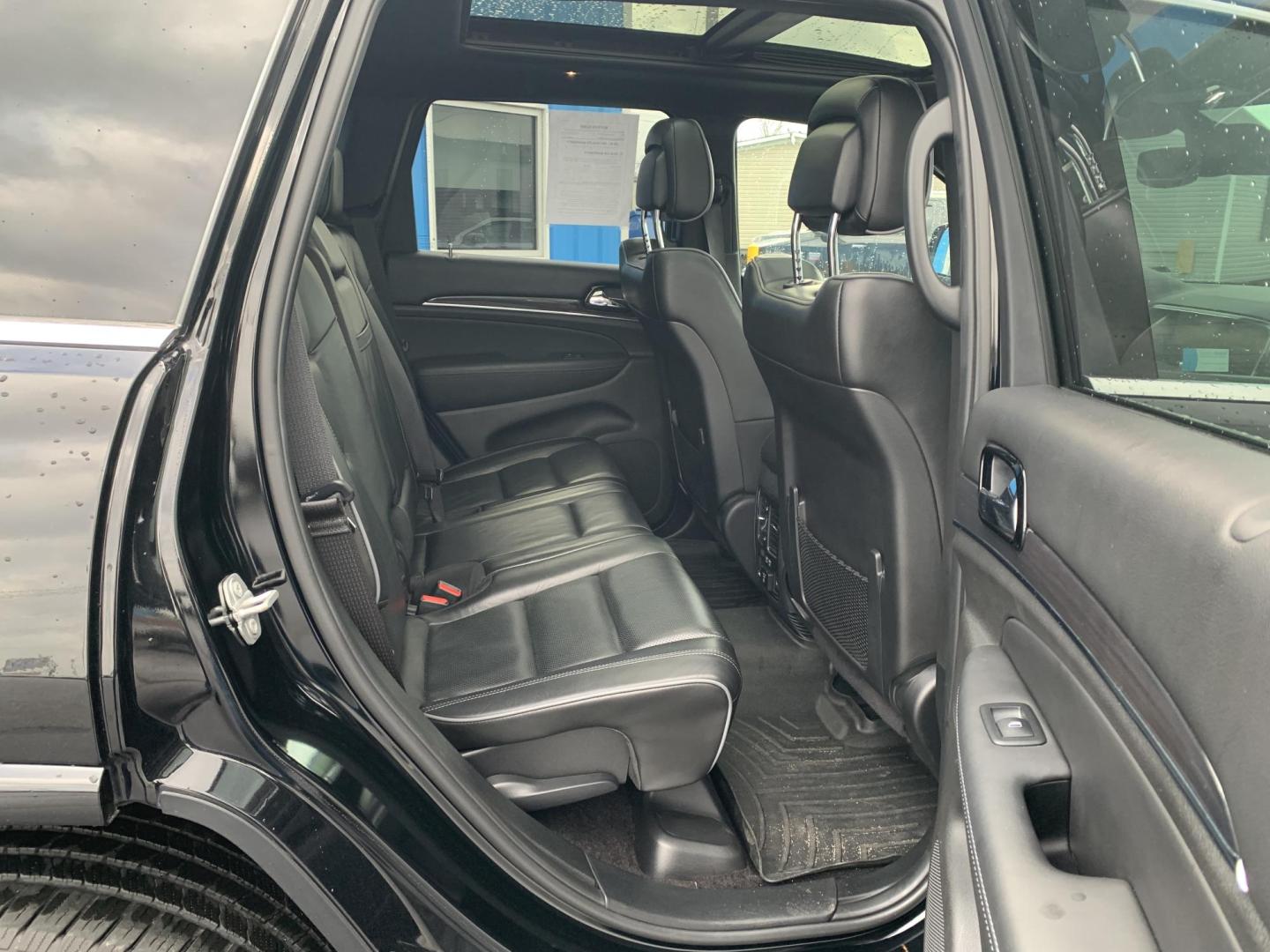 2019 BLACK /BLACK Jeep Grand Cherokee Overland 4WD (1C4RJFCG1KC) with an 3.6L V6 DOHC 24V engine, Automatic transmission, located at 506 S. Kingshighway, Cape Girardeau, MO, 63703, (573) 235-5000, 37.294991, -89.553635 - 2019 Jeep Grand Cherokee Overland 4WD Only 74,xxx miles Alarm System Bluetooth Cruise Control Dual Power Front Seats Folding Rear Seat Heated Seats Heated Steering Wheel Integrated Garage Door Opener Leather Seats Navigation System Power Driver's Seat Power Windows Rear Window Defroste - Photo#12