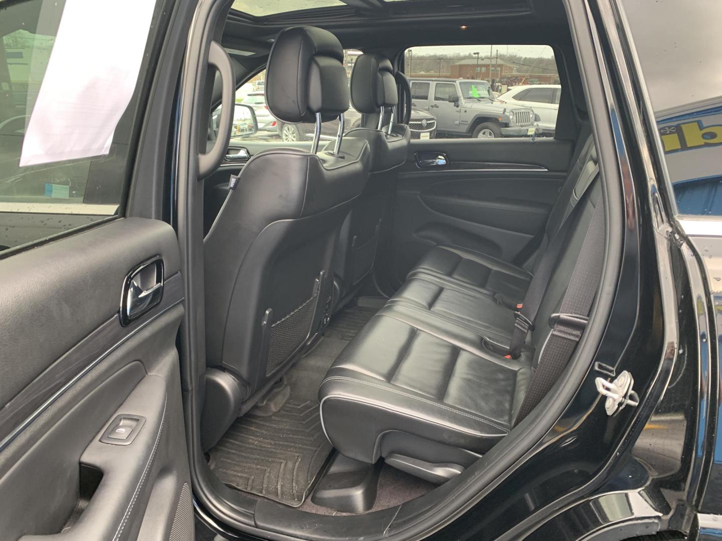 2019 BLACK /BLACK Jeep Grand Cherokee Overland 4WD (1C4RJFCG1KC) with an 3.6L V6 DOHC 24V engine, Automatic transmission, located at 506 S. Kingshighway, Cape Girardeau, MO, 63703, (573) 235-5000, 37.294991, -89.553635 - 2019 Jeep Grand Cherokee Overland 4WD Only 74,xxx miles Alarm System Bluetooth Cruise Control Dual Power Front Seats Folding Rear Seat Heated Seats Heated Steering Wheel Integrated Garage Door Opener Leather Seats Navigation System Power Driver's Seat Power Windows Rear Window Defroste - Photo#14