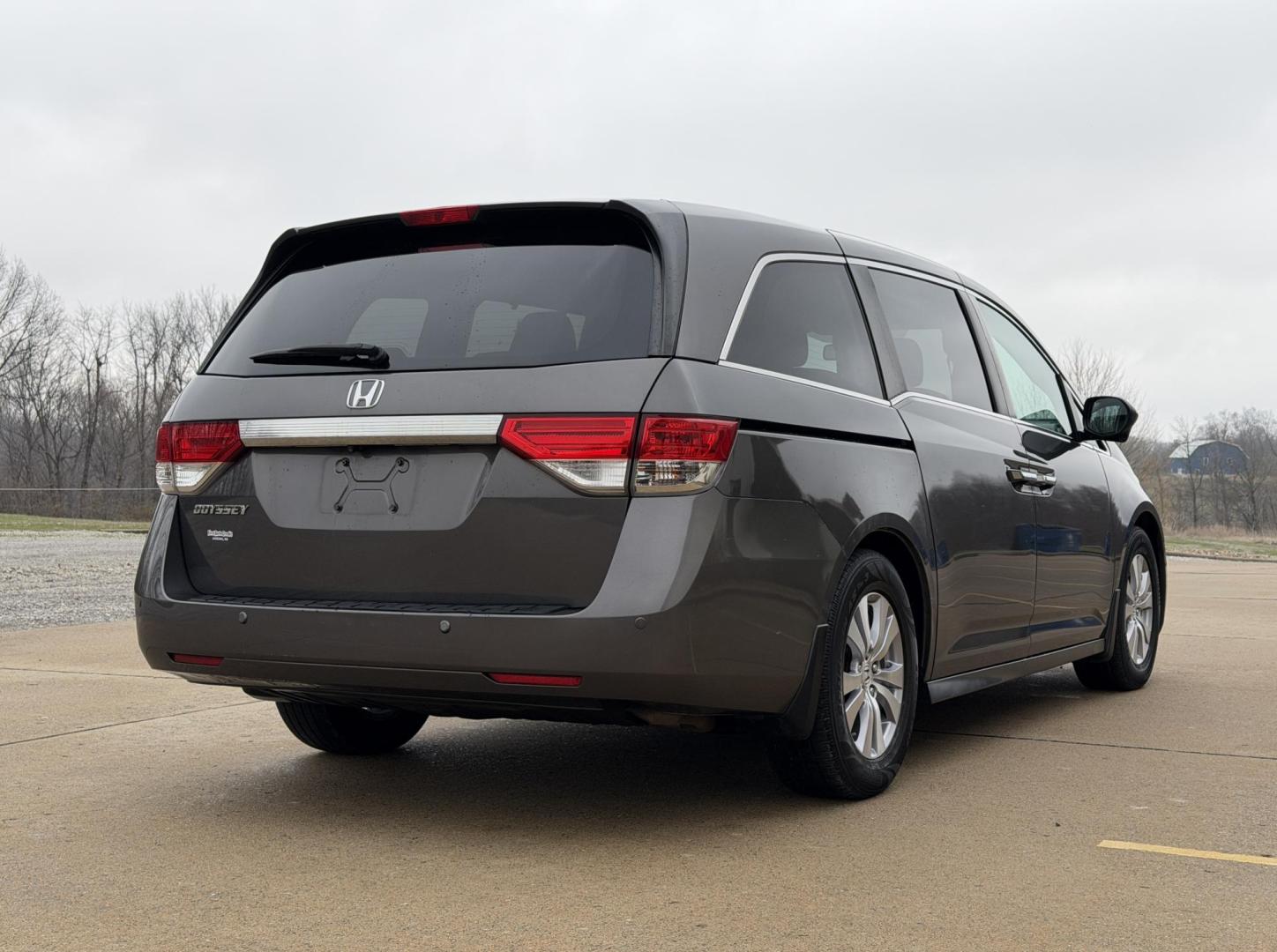 2015 GRAY /Gray Honda Odyssey EX-L (5FNRL5H63FB) with an 3.5L V6 engine, Automatic transmission, located at 2990 Old Orchard Rd., Jackson, MO, 63755, 37.354214, -89.612106 - 2015 Honda Odyssey EX-L 187xxx miles Front Wheel Drive 3.5L V6 Automatic Leather 3rd Row Rear Entertainment Power/Heated Seats Backup Camera Sunroof Bluetooth Cruise Power Windows/Locks/Mirrors We have financing available and we accept trades! Fill out a credit application on our websi - Photo#11