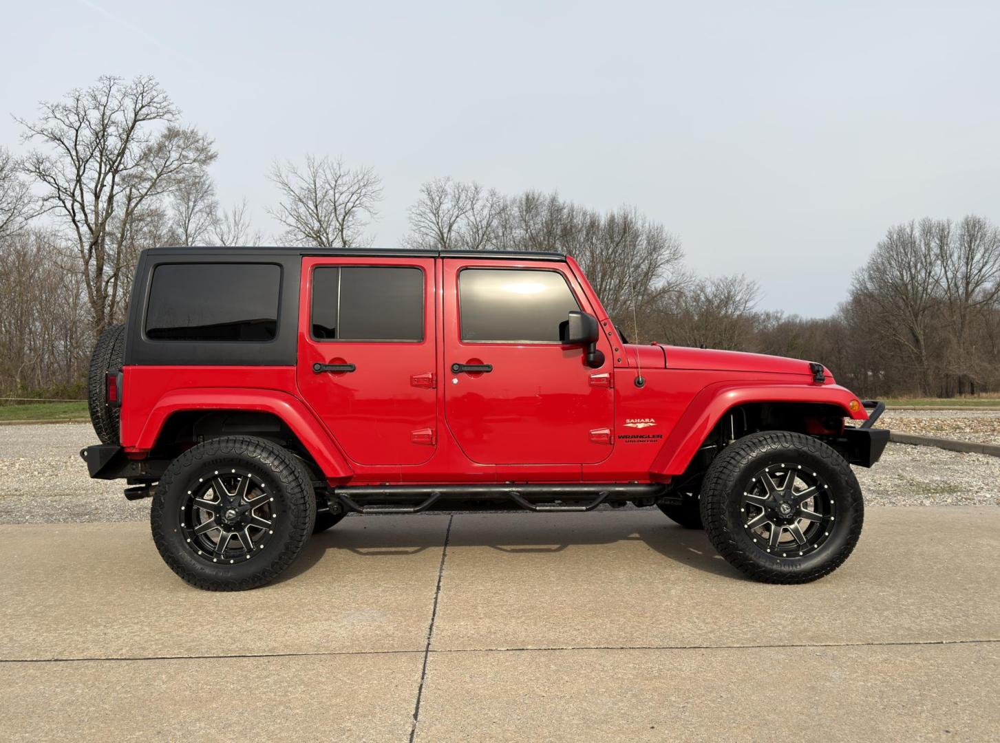 2015 RED /Black Jeep Wrangler Unlimited Sahara 4WD (1C4BJWEG9FL) with an 3.6L V6 engine, Automatic transmission, located at 2990 Old Orchard Rd., Jackson, MO, 63755, 37.354214, -89.612106 - 2015 Jeep Wrangler Unlimited Sahara 127xxx miles 4x4 3.6L V6 Automatic Navigation Bluetooth Remote Start Cruise Power Windows/Locks/Mirrors We have financing available and we accept trades! Fill out a credit application on our website or come by today! If you have any questions, give us a - Photo#7