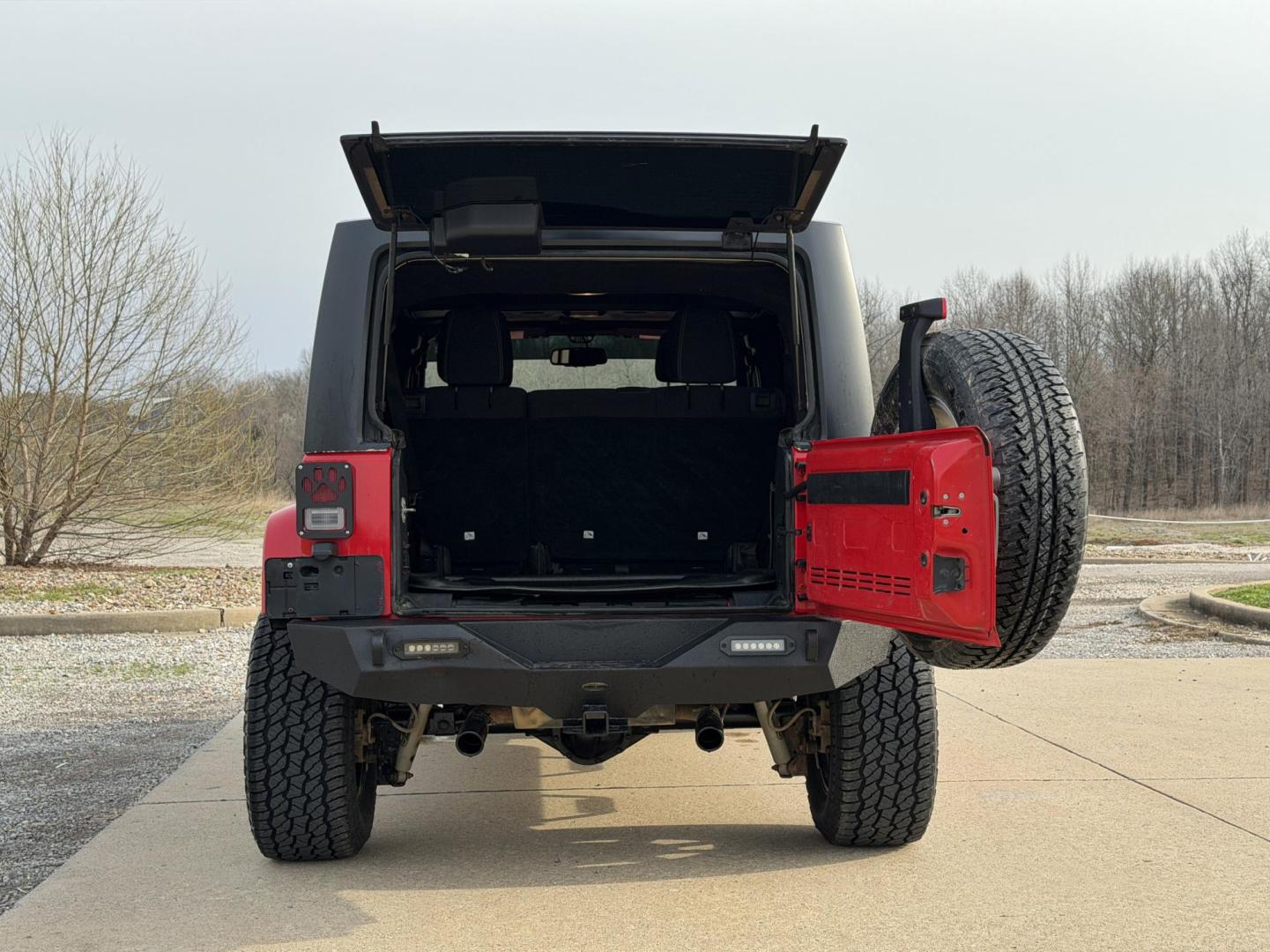 2015 RED /Black Jeep Wrangler Unlimited Sahara 4WD (1C4BJWEG9FL) with an 3.6L V6 engine, Automatic transmission, located at 2990 Old Orchard Rd., Jackson, MO, 63755, 37.354214, -89.612106 - 2015 Jeep Wrangler Unlimited Sahara 127xxx miles 4x4 3.6L V6 Automatic Navigation Bluetooth Remote Start Cruise Power Windows/Locks/Mirrors We have financing available and we accept trades! Fill out a credit application on our website or come by today! If you have any questions, give us a - Photo#18
