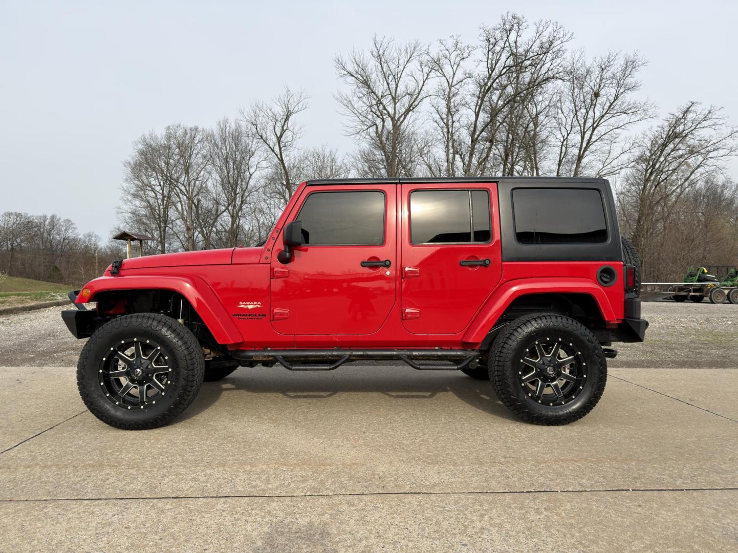 2015 RED /Black Jeep Wrangler Unlimited Sahara 4WD (1C4BJWEG9FL) with an 3.6L V6 engine, Automatic transmission, located at 2990 Old Orchard Rd., Jackson, MO, 63755, 37.354214, -89.612106 - 2015 Jeep Wrangler Unlimited Sahara 127xxx miles 4x4 3.6L V6 Automatic Navigation Bluetooth Remote Start Cruise Power Windows/Locks/Mirrors We have financing available and we accept trades! Fill out a credit application on our website or come by today! If you have any questions, give us a - Photo#6