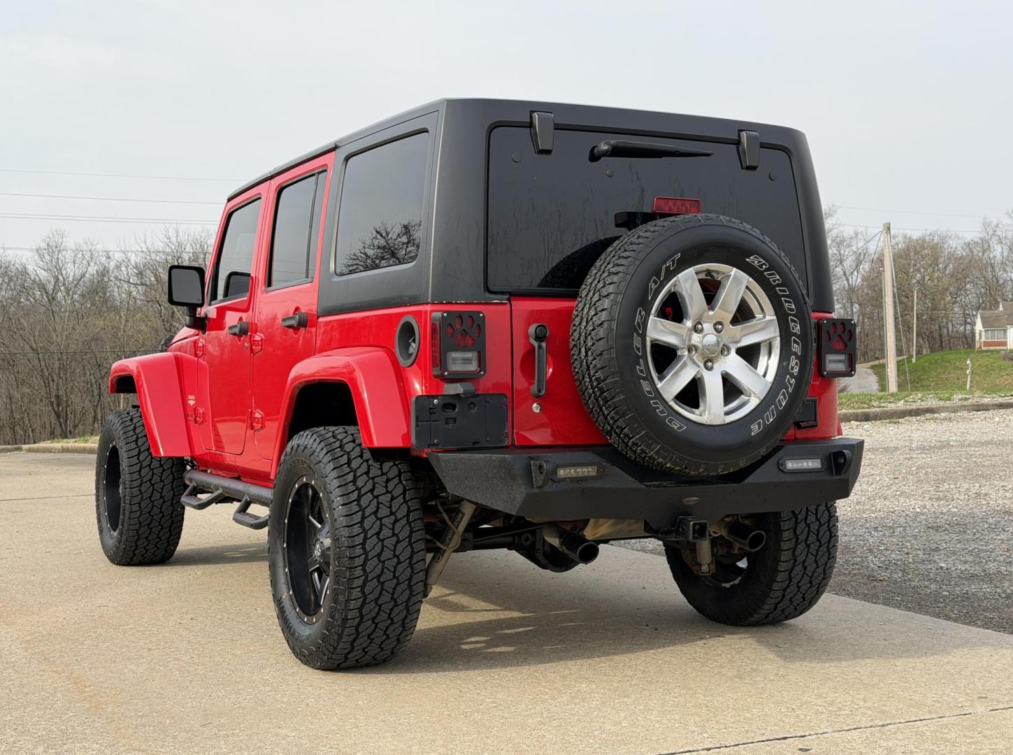 2015 RED /Black Jeep Wrangler Unlimited Sahara 4WD (1C4BJWEG9FL) with an 3.6L V6 engine, Automatic transmission, located at 2990 Old Orchard Rd., Jackson, MO, 63755, 37.354214, -89.612106 - 2015 Jeep Wrangler Unlimited Sahara 127xxx miles 4x4 3.6L V6 Automatic Navigation Bluetooth Remote Start Cruise Power Windows/Locks/Mirrors We have financing available and we accept trades! Fill out a credit application on our website or come by today! If you have any questions, give us a - Photo#9