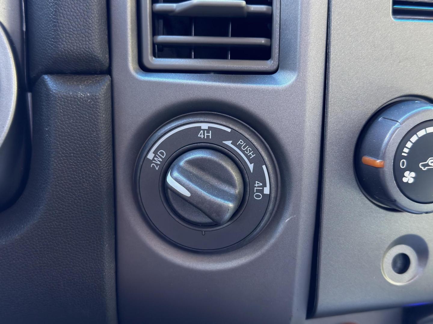 2007 RED /Black Nissan Titan XE Crew Cab 4WD (1N6AA07B37N) with an 5.6L V8 engine, Automatic transmission, located at 2990 Old Orchard Rd., Jackson, MO, 63755, 37.354214, -89.612106 - 2007 Nissan Titan XE 165xxx miles 4x4 5.6L V8 Automatic Backup Camera Bluetooth Cruise Power Windows/Locks/Mirrors We have financing available and we accept trades! Fill out a credit application on our website or come by today! If you have any questions, give us a call at (573) 204-7777 or - Photo#2