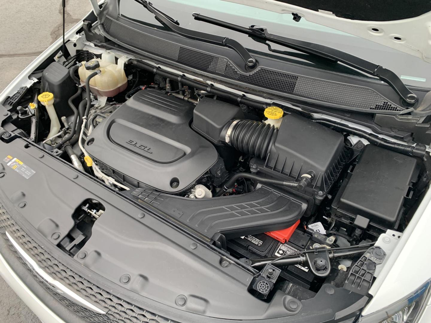 2022 WHITE /BLACK Chrysler Voyager LX (2C4RC1CG7NR) with an 3.6L V6 DOHC 24V engine, Automatic transmission, located at 506 S. Kingshighway, Cape Girardeau, MO, 63703, (573) 235-5000, 37.294991, -89.553635 - 2022 Chrysler Voyager LX One Owner 79,xxx miles CarPlay Heated Seats Heated Steering Wheel Power sliding doors Bluetooth Cruise Backup Camera We have financing available and we accept trades! Fill out a credit application on our website or come by today! If you have any questions, give - Photo#2