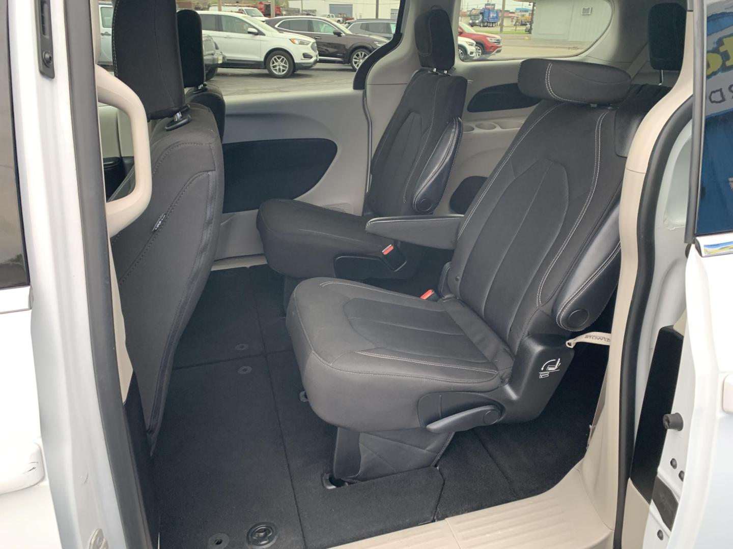 2022 WHITE /BLACK Chrysler Voyager LX (2C4RC1CG7NR) with an 3.6L V6 DOHC 24V engine, Automatic transmission, located at 506 S. Kingshighway, Cape Girardeau, MO, 63703, (573) 235-5000, 37.294991, -89.553635 - 2022 Chrysler Voyager LX One Owner 79,xxx miles CarPlay Heated Seats Heated Steering Wheel Power sliding doors Bluetooth Cruise Backup Camera We have financing available and we accept trades! Fill out a credit application on our website or come by today! If you have any questions, give - Photo#16