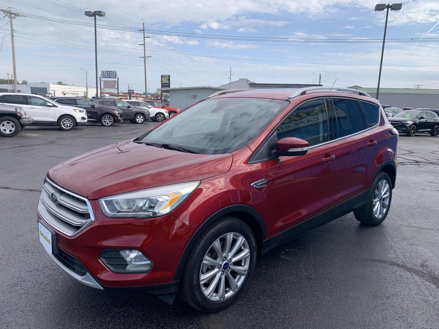 2017 MAROON /TAN Ford Escape Titanium FWD (1FMCU0J92HU) with an 2.0L L4 DOHC 16V engine, Automatic transmission, located at 506 S. Kingshighway, Cape Girardeau, MO, 63703, (573) 235-5000, 37.294991, -89.553635 - 2017 Ford Escape Titanium 93,xxx miles Leather Seats Heated Seats Backup Camera Bluetooth Cruise Power Windows/Locks/Mirrors We have financing available and we accept trades! Fill out a credit application on our website or come by today! If you have any questions, give us a call at (573 - Photo#2