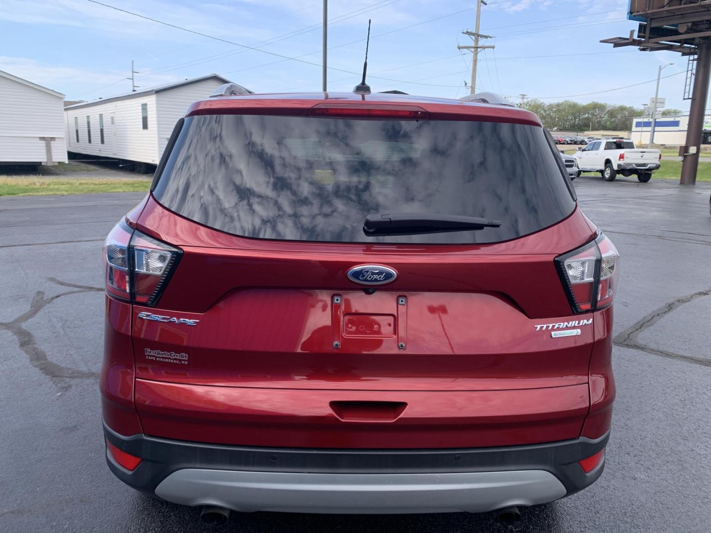 2017 MAROON /TAN Ford Escape Titanium FWD (1FMCU0J92HU) with an 2.0L L4 DOHC 16V engine, Automatic transmission, located at 506 S. Kingshighway, Cape Girardeau, MO, 63703, (573) 235-5000, 37.294991, -89.553635 - 2017 Ford Escape Titanium 93,xxx miles Leather Seats Heated Seats Backup Camera Bluetooth Cruise Power Windows/Locks/Mirrors We have financing available and we accept trades! Fill out a credit application on our website or come by today! If you have any questions, give us a call at (573 - Photo#5