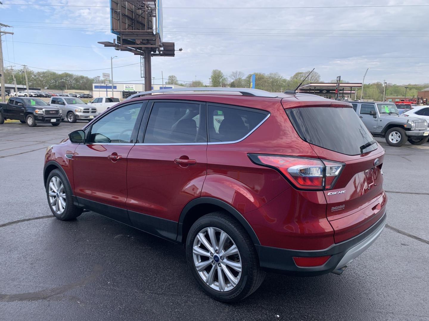 2017 MAROON /TAN Ford Escape Titanium FWD (1FMCU0J92HU) with an 2.0L L4 DOHC 16V engine, Automatic transmission, located at 506 S. Kingshighway, Cape Girardeau, MO, 63703, (573) 235-5000, 37.294991, -89.553635 - 2017 Ford Escape Titanium 93,xxx miles Leather Seats Heated Seats Backup Camera Bluetooth Cruise Power Windows/Locks/Mirrors We have financing available and we accept trades! Fill out a credit application on our website or come by today! If you have any questions, give us a call at (573 - Photo#4