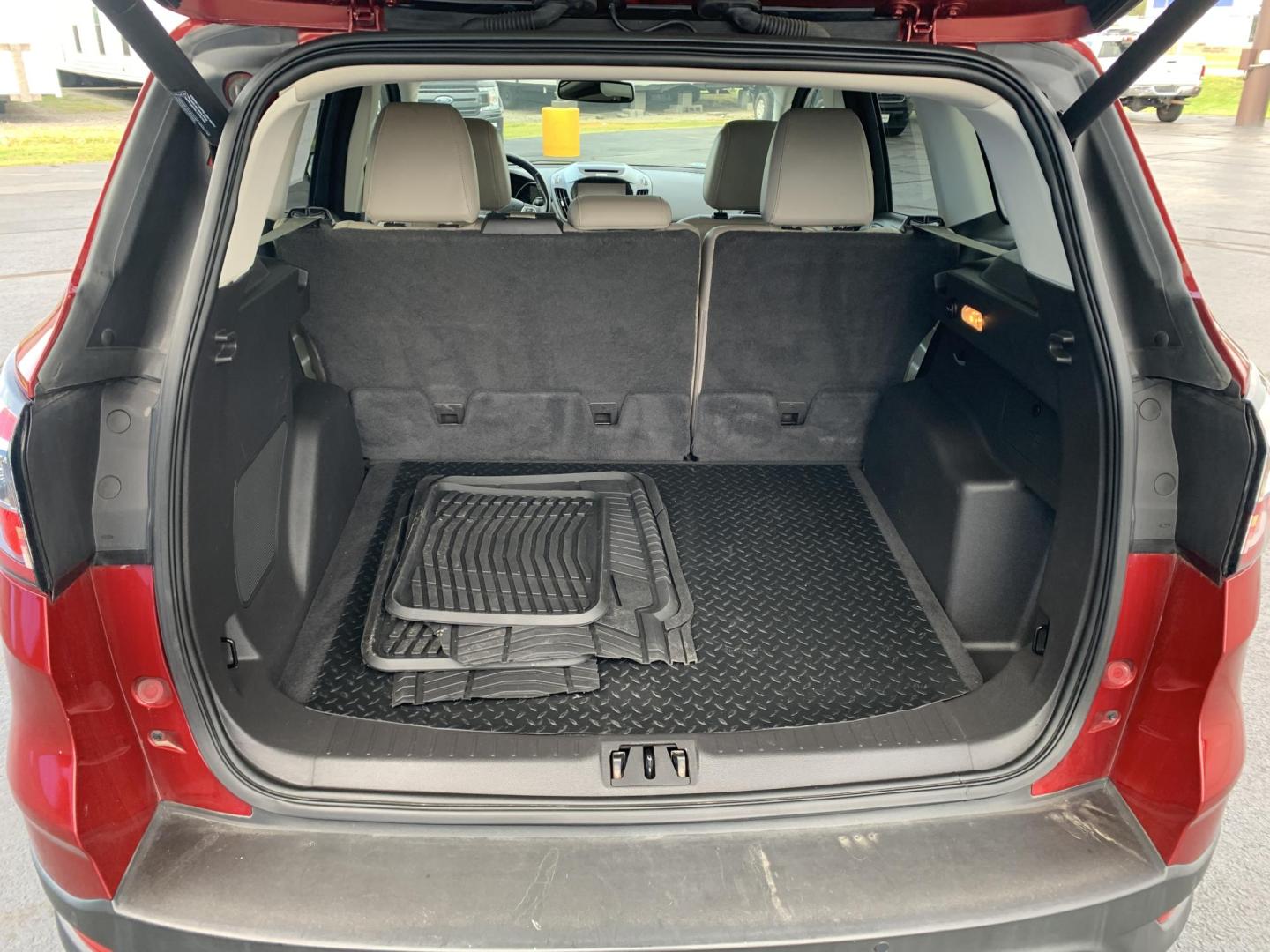 2017 MAROON /TAN Ford Escape Titanium FWD (1FMCU0J92HU) with an 2.0L L4 DOHC 16V engine, Automatic transmission, located at 506 S. Kingshighway, Cape Girardeau, MO, 63703, (573) 235-5000, 37.294991, -89.553635 - 2017 Ford Escape Titanium 93,xxx miles Leather Seats Heated Seats Backup Camera Bluetooth Cruise Power Windows/Locks/Mirrors We have financing available and we accept trades! Fill out a credit application on our website or come by today! If you have any questions, give us a call at (573 - Photo#6