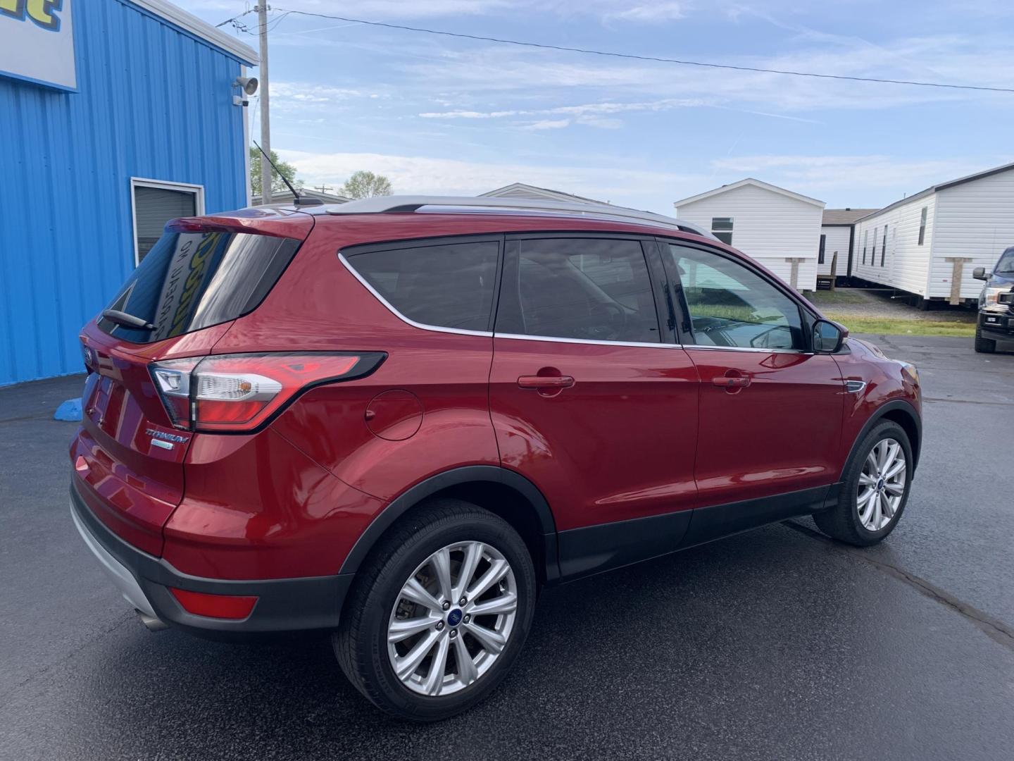 2017 MAROON /TAN Ford Escape Titanium FWD (1FMCU0J92HU) with an 2.0L L4 DOHC 16V engine, Automatic transmission, located at 506 S. Kingshighway, Cape Girardeau, MO, 63703, (573) 235-5000, 37.294991, -89.553635 - 2017 Ford Escape Titanium 93,xxx miles Leather Seats Heated Seats Backup Camera Bluetooth Cruise Power Windows/Locks/Mirrors We have financing available and we accept trades! Fill out a credit application on our website or come by today! If you have any questions, give us a call at (573 - Photo#8