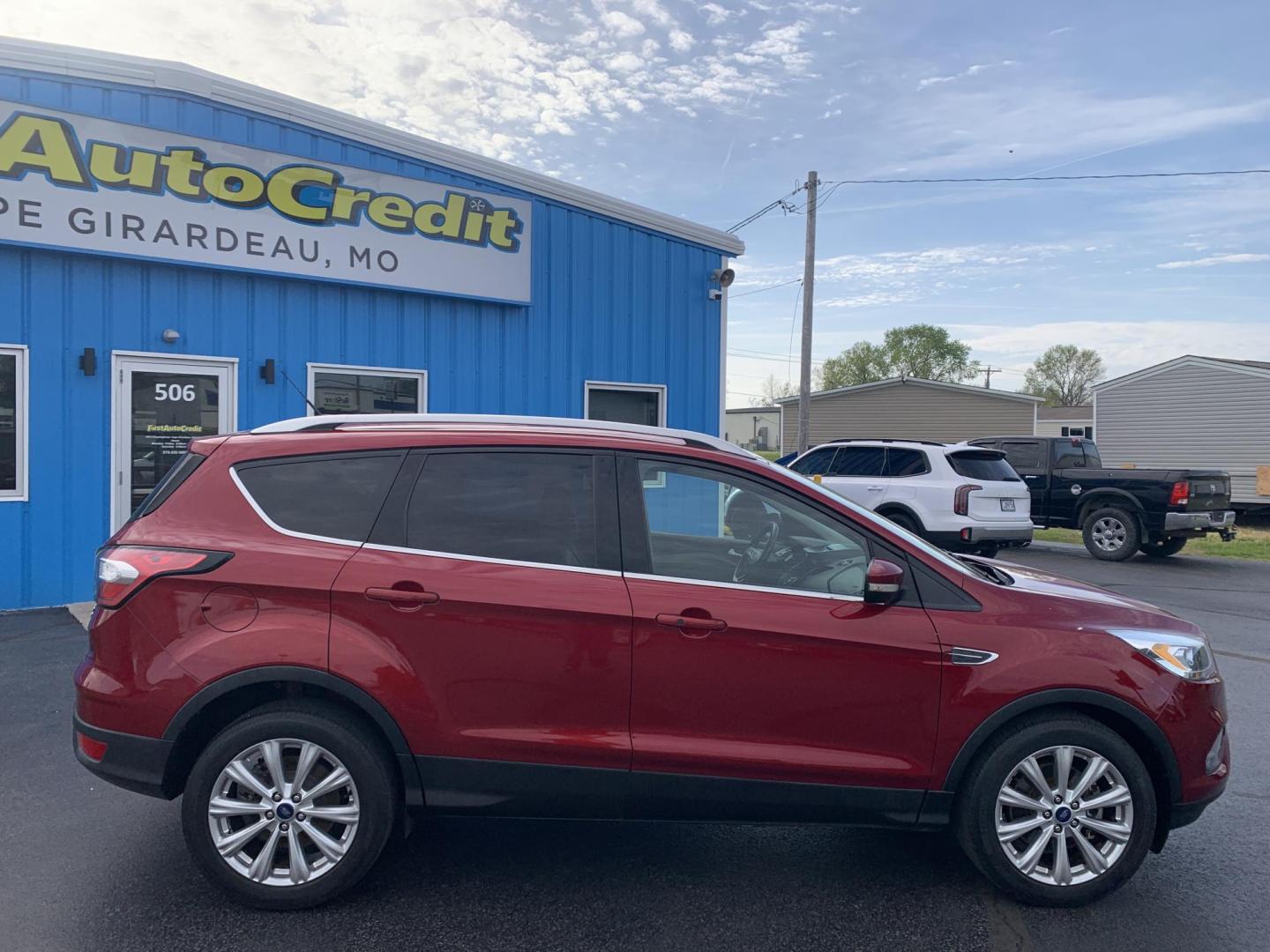 2017 MAROON /TAN Ford Escape Titanium FWD (1FMCU0J92HU) with an 2.0L L4 DOHC 16V engine, Automatic transmission, located at 506 S. Kingshighway, Cape Girardeau, MO, 63703, (573) 235-5000, 37.294991, -89.553635 - 2017 Ford Escape Titanium 93,xxx miles Leather Seats Heated Seats Backup Camera Bluetooth Cruise Power Windows/Locks/Mirrors We have financing available and we accept trades! Fill out a credit application on our website or come by today! If you have any questions, give us a call at (573 - Photo#9