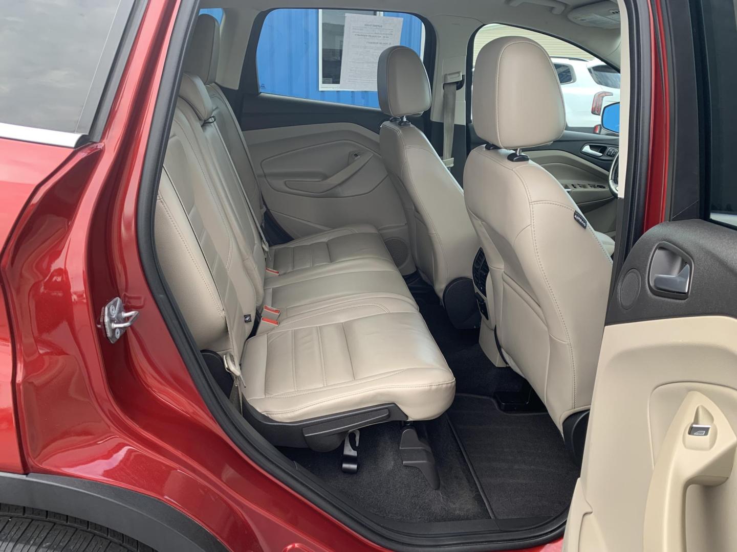 2017 MAROON /TAN Ford Escape Titanium FWD (1FMCU0J92HU) with an 2.0L L4 DOHC 16V engine, Automatic transmission, located at 506 S. Kingshighway, Cape Girardeau, MO, 63703, (573) 235-5000, 37.294991, -89.553635 - 2017 Ford Escape Titanium 93,xxx miles Leather Seats Heated Seats Backup Camera Bluetooth Cruise Power Windows/Locks/Mirrors We have financing available and we accept trades! Fill out a credit application on our website or come by today! If you have any questions, give us a call at (573 - Photo#13