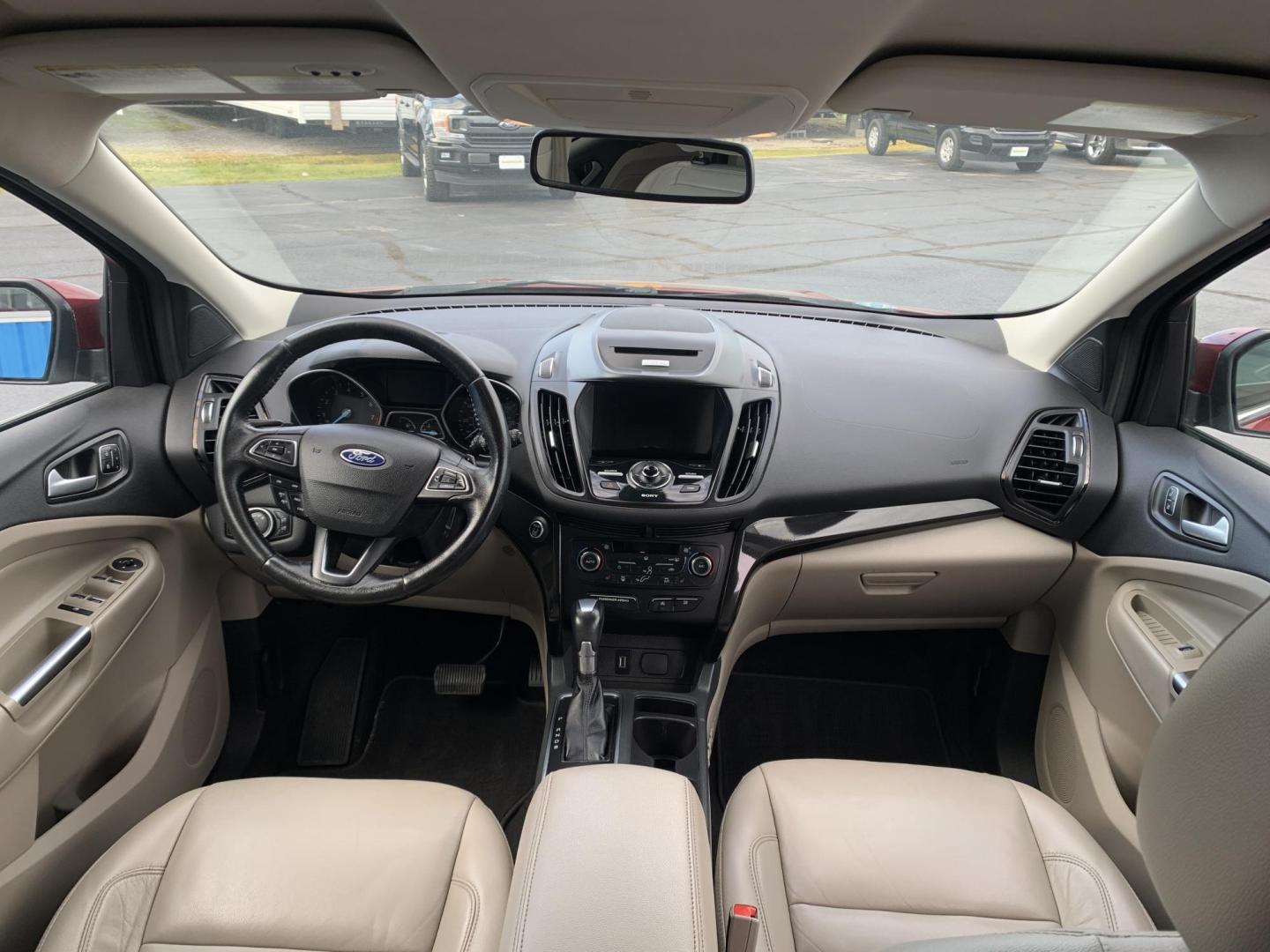 2017 MAROON /TAN Ford Escape Titanium FWD (1FMCU0J92HU) with an 2.0L L4 DOHC 16V engine, Automatic transmission, located at 506 S. Kingshighway, Cape Girardeau, MO, 63703, (573) 235-5000, 37.294991, -89.553635 - 2017 Ford Escape Titanium 93,xxx miles Leather Seats Heated Seats Backup Camera Bluetooth Cruise Power Windows/Locks/Mirrors We have financing available and we accept trades! Fill out a credit application on our website or come by today! If you have any questions, give us a call at (573 - Photo#15