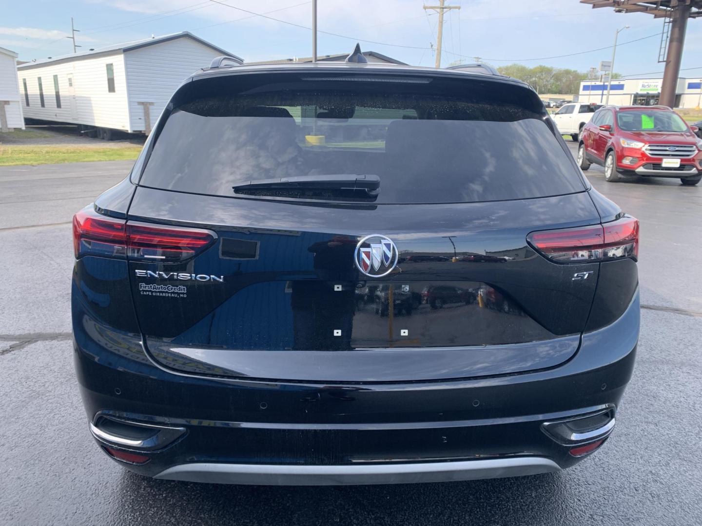 2022 BLACK /BLACK Buick Envision Essense (LRBFZNR44ND) with an 2.0L L4 DOHC 24V TURBO engine, Automatic transmission, located at 506 S. Kingshighway, Cape Girardeau, MO, 63703, (573) 235-5000, 37.294991, -89.553635 - 2022 Buick Envision Essense 42,xxx Miles Backup Camera Heated Seats Power Seats Heated Steering Wheel Adaptive Cruise Leather Seats Power Windows/Locks/Mirrors We have financing available and we accept trades! Fill out a credit application on our website or come by today! If you have any - Photo#6