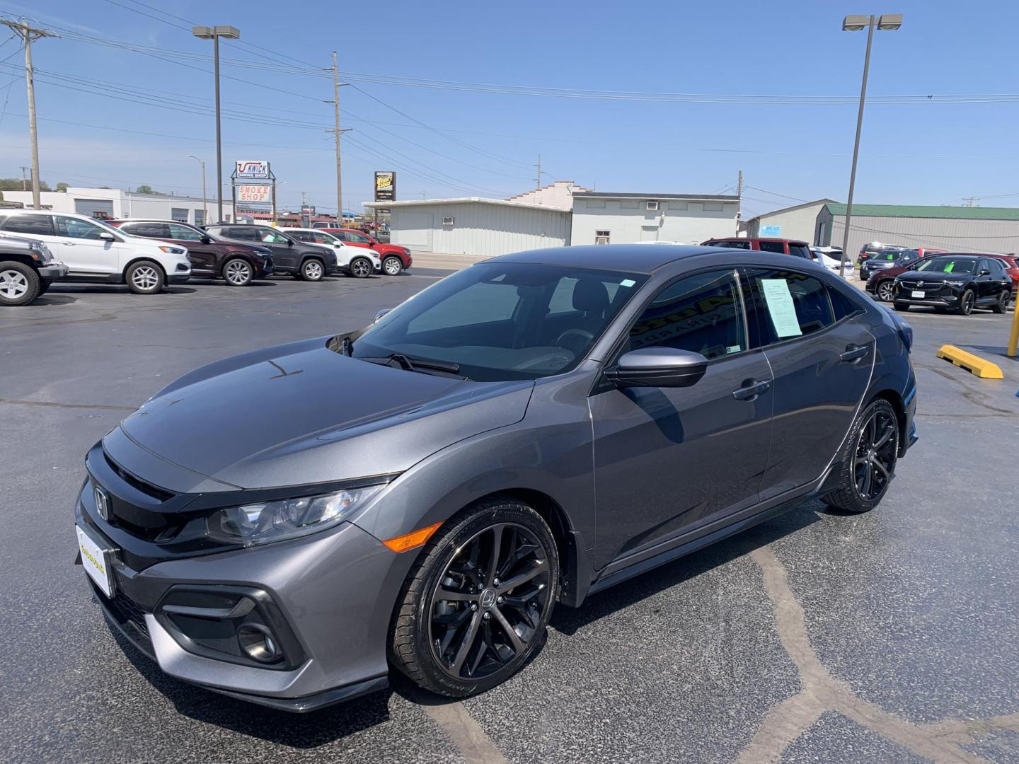 2021 GRAY /GRAY Honda Civic Sport Hatchback (SHHFK7H4XMU) with an 2.0L L4 DOHC 16V TURBO engine, Automatic transmission, located at 506 S. Kingshighway, Cape Girardeau, MO, 63703, (573) 235-5000, 37.294991, -89.553635 - 2021 Honda Civic Sport Hatchback 59,xxx miles Alarm System Bluetooth Streaming Audio Bluetooth Wireless Technology Cloth Seats Cruise Control Folding Rear Seat Power Outlet Power Windows Proximity Sensing Keyless Entry Push-Button Engine Start Rear Window Defroster Remote Control Liftga - Photo#3