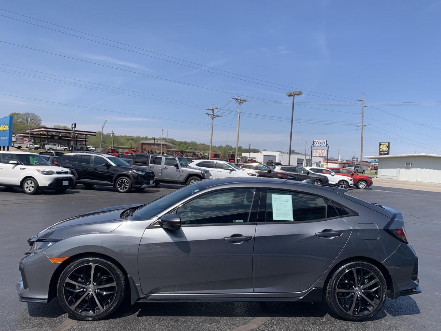 2021 GRAY /GRAY Honda Civic Sport Hatchback (SHHFK7H4XMU) with an 2.0L L4 DOHC 16V TURBO engine, Automatic transmission, located at 506 S. Kingshighway, Cape Girardeau, MO, 63703, (573) 235-5000, 37.294991, -89.553635 - 2021 Honda Civic Sport Hatchback 59,xxx miles Alarm System Bluetooth Streaming Audio Bluetooth Wireless Technology Cloth Seats Cruise Control Folding Rear Seat Power Outlet Power Windows Proximity Sensing Keyless Entry Push-Button Engine Start Rear Window Defroster Remote Control Liftga - Photo#4