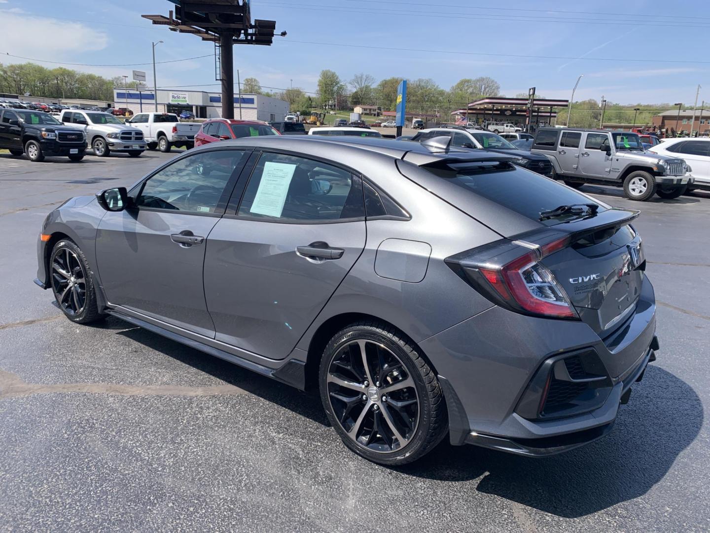 2021 GRAY /GRAY Honda Civic Sport Hatchback (SHHFK7H4XMU) with an 2.0L L4 DOHC 16V TURBO engine, Automatic transmission, located at 506 S. Kingshighway, Cape Girardeau, MO, 63703, (573) 235-5000, 37.294991, -89.553635 - 2021 Honda Civic Sport Hatchback 59,xxx miles Alarm System Bluetooth Streaming Audio Bluetooth Wireless Technology Cloth Seats Cruise Control Folding Rear Seat Power Outlet Power Windows Proximity Sensing Keyless Entry Push-Button Engine Start Rear Window Defroster Remote Control Liftga - Photo#5