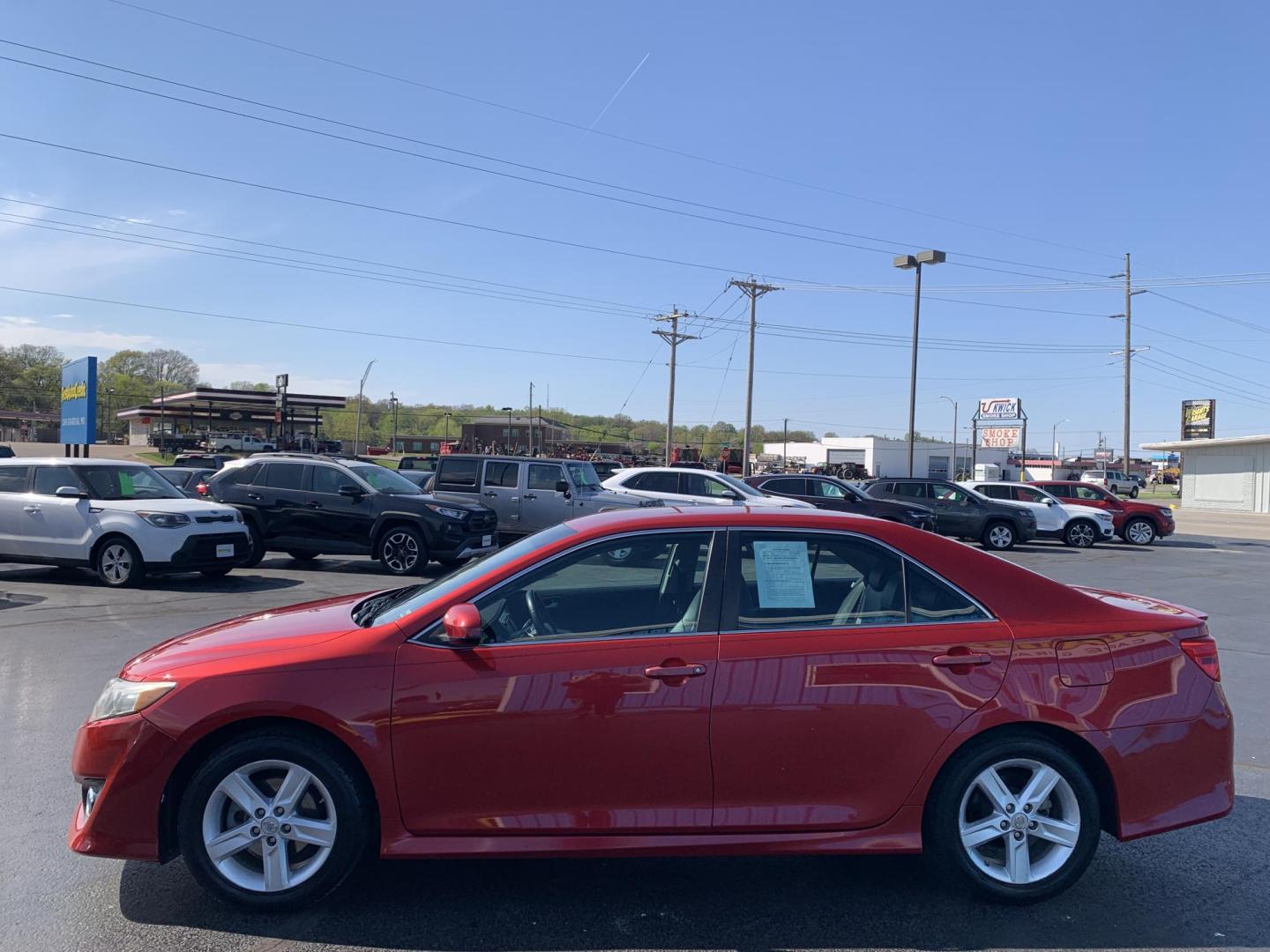 2012 RED /BLACK Toyota Camry SE (4T1BF1FK9CU) with an 2.5L L4 DOHC 16V engine, Automatic transmission, located at 506 S. Kingshighway, Cape Girardeau, MO, 63703, (573) 235-5000, 37.294991, -89.553635 - 2012 Toyota Camry SE 151,xxx miles Cruise Bluetooth USB Power Windows/Locks/Mirrors We have financing available and we accept trades! Fill out a credit application on our website or come by today! If you have any questions, give us a call at (573) 235-5000 or visit our website at firstautoc - Photo#3