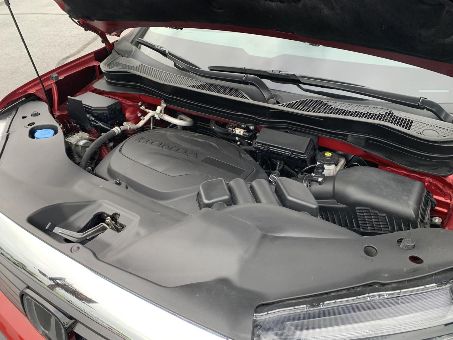 2022 RED /BLACK Honda Ridgeline RTL-E AWD (5FPYK3F71NB) with an 3.5L V6 SOHC 24V engine, Automatic transmission, located at 506 S. Kingshighway, Cape Girardeau, MO, 63703, (573) 235-5000, 37.294991, -89.553635 - 2022 Honda Ridgeline RTL-E AWD 69,xxx miles Adaptive Cruise Lane Departure Warning All Wheel Drive Power Seats Heated Seats Leather Seats Sunroof We have financing available and we accept trades! Fill out a credit application on our website or come by today! If you have any questions, gi - Photo#2