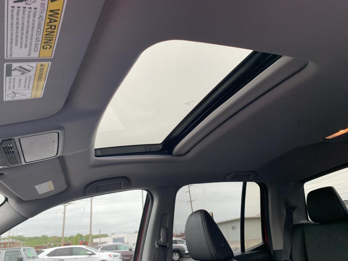 2022 RED /BLACK Honda Ridgeline RTL-E AWD (5FPYK3F71NB) with an 3.5L V6 SOHC 24V engine, Automatic transmission, located at 506 S. Kingshighway, Cape Girardeau, MO, 63703, (573) 235-5000, 37.294991, -89.553635 - 2022 Honda Ridgeline RTL-E AWD 69,xxx miles Adaptive Cruise Lane Departure Warning All Wheel Drive Power Seats Heated Seats Leather Seats Sunroof We have financing available and we accept trades! Fill out a credit application on our website or come by today! If you have any questions, gi - Photo#24