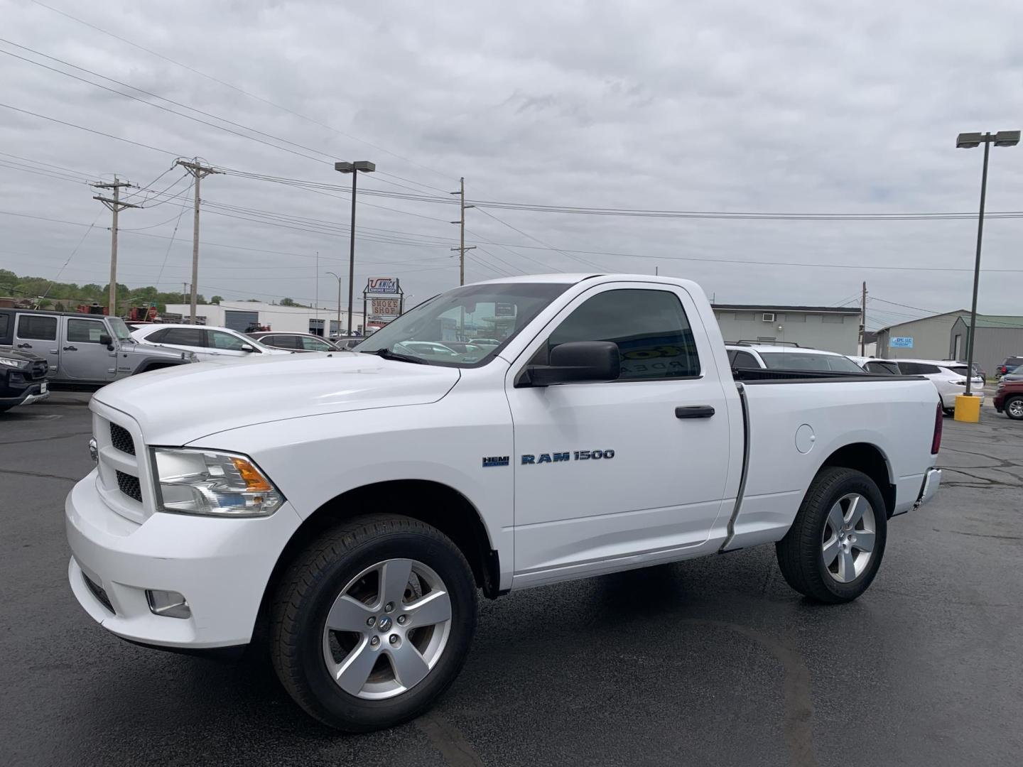 2012 WHITE /BLACK Dodge Ram 1500 ST SWB 4WD (3C6JD7AT3CG) with an 5.7L V8 OHV 16V engine, Automatic transmission, located at 506 S. Kingshighway, Cape Girardeau, MO, 63703, (573) 235-5000, 37.294991, -89.553635 - 2012 Dodge Ram 1500 ST SWB 4WD 140,xxx miles Hemi Motor 4WD Cruise Bluetooth Power Windows/Locks/Mirrors We have financing available and we accept trades! Fill out a credit application on our website or come by today! If you have any questions, give us a call at (573) 235-5000 or visit our - Photo#3