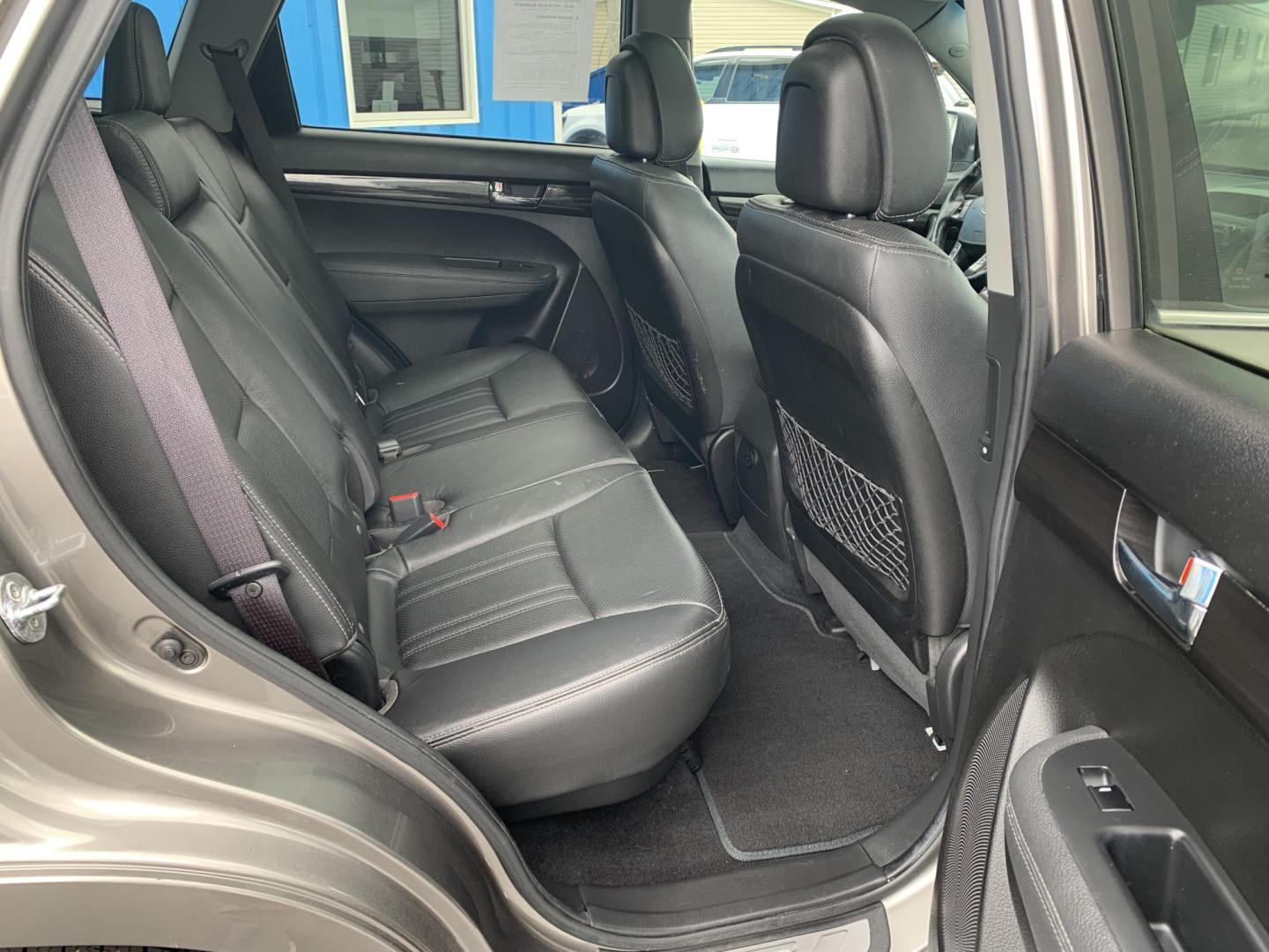 2013 GRAY /BLACK Kia Sorento SX AWD (5XYKWDA22DG) with an 3.5L V6 DOHC 24V engine, Automatic transmission, located at 506 S. Kingshighway, Cape Girardeau, MO, 63703, (573) 235-5000, 37.294991, -89.553635 - 2013 Kia Sorento SX AWD 97,xxx miles Heated and Cooled Drivers Seat Heated Steering Wheel AWD Bluetooth Power Seats Leather Seats Sun Roof 3rd. Row We have financing available and we accept trades! Fill out a credit application on our website or come by today! If you have any questions, - Photo#13