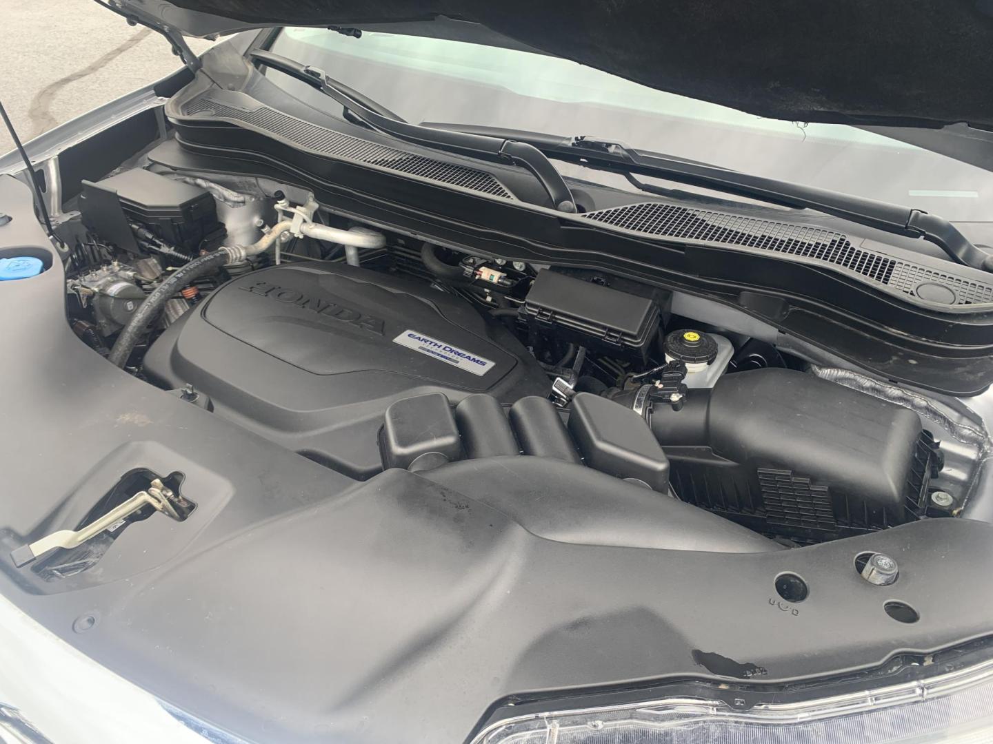 2019 SILVER /GRAY Honda Pilot EX 4WD (5FNYF6H32KB) with an 3.5L V6 SOHC 24V engine, Automatic transmission, located at 506 S. Kingshighway, Cape Girardeau, MO, 63703, (573) 235-5000, 37.294991, -89.553635 - 2019 Honda Pilot EX 4WD 104,xxx miles Adaptive Cruise Lane Warning Apple CarPlay Heated Seats Cloth Seats 3rd. Row Power Windows/Locks/Mirrors We have financing available and we accept trades! Fill out a credit application on our website or come by today! If you have any questions, give - Photo#2