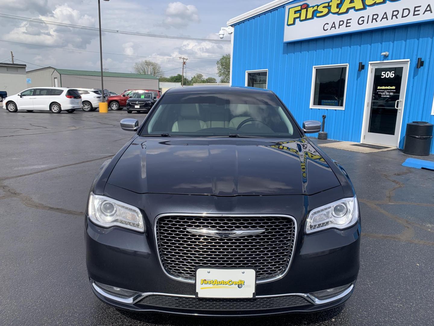 2016 BLUE /TAN Chrysler 300 C AWD (2C3CCAKGXGH) with an 3.6L V6 SOHC 24V engine, Automatic transmission, located at 506 S. Kingshighway, Cape Girardeau, MO, 63703, (573) 235-5000, 37.294991, -89.553635 - 2016 Chrysler 300 C AWD 178,xxx miles Heated Steering Wheel Heated Seats All Wheel Drive Power Seats Sunroof Bluetooth Cruise Power Windows/Locks/Mirrors Remote Start We have financing available and we accept trades! Fill out a credit application on our website or come by today! If you - Photo#1