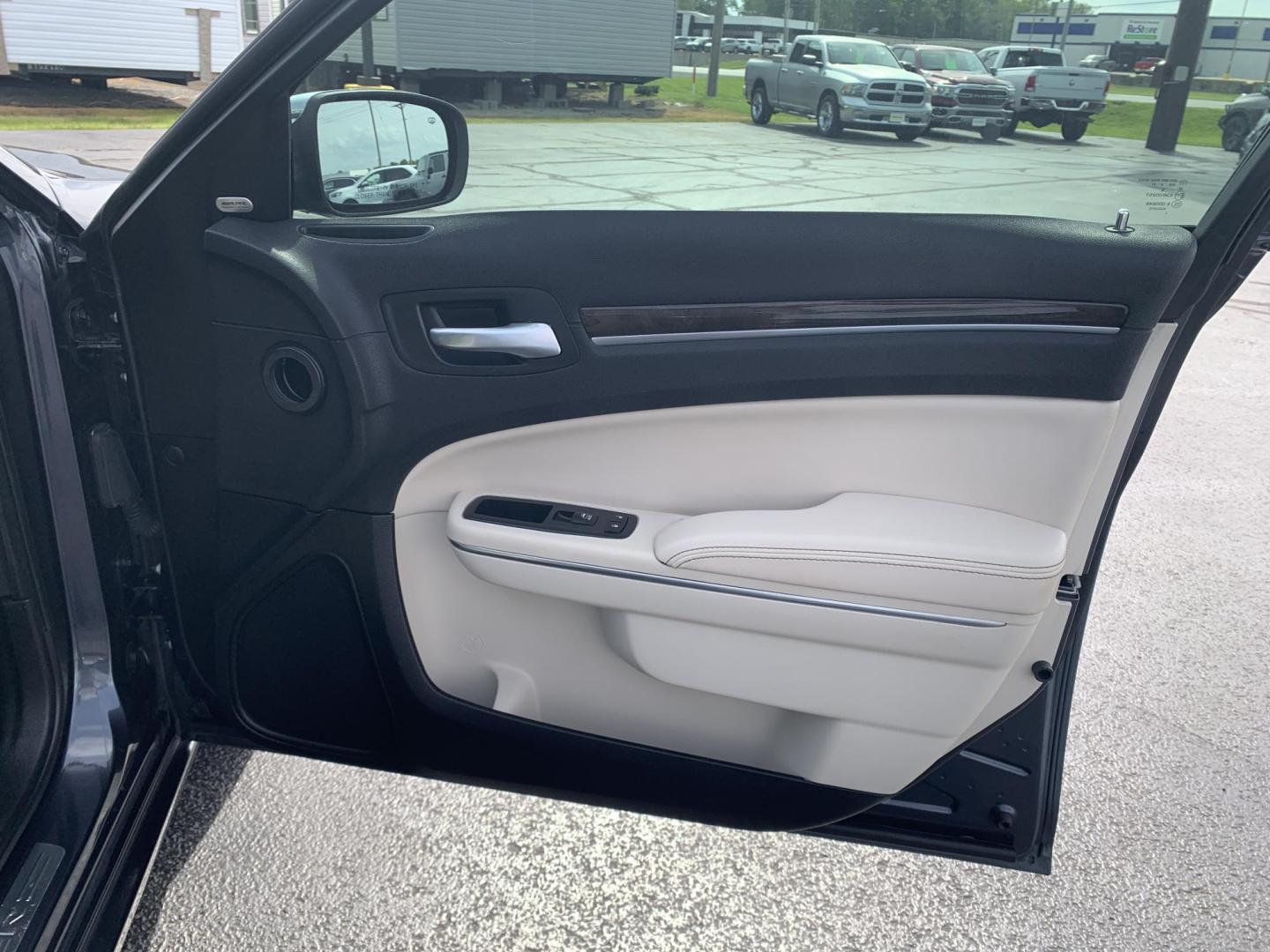 2016 BLUE /TAN Chrysler 300 C AWD (2C3CCAKGXGH) with an 3.6L V6 SOHC 24V engine, Automatic transmission, located at 506 S. Kingshighway, Cape Girardeau, MO, 63703, (573) 235-5000, 37.294991, -89.553635 - 2016 Chrysler 300 C AWD 178,xxx miles Heated Steering Wheel Heated Seats All Wheel Drive Power Seats Sunroof Bluetooth Cruise Power Windows/Locks/Mirrors Remote Start We have financing available and we accept trades! Fill out a credit application on our website or come by today! If you - Photo#10