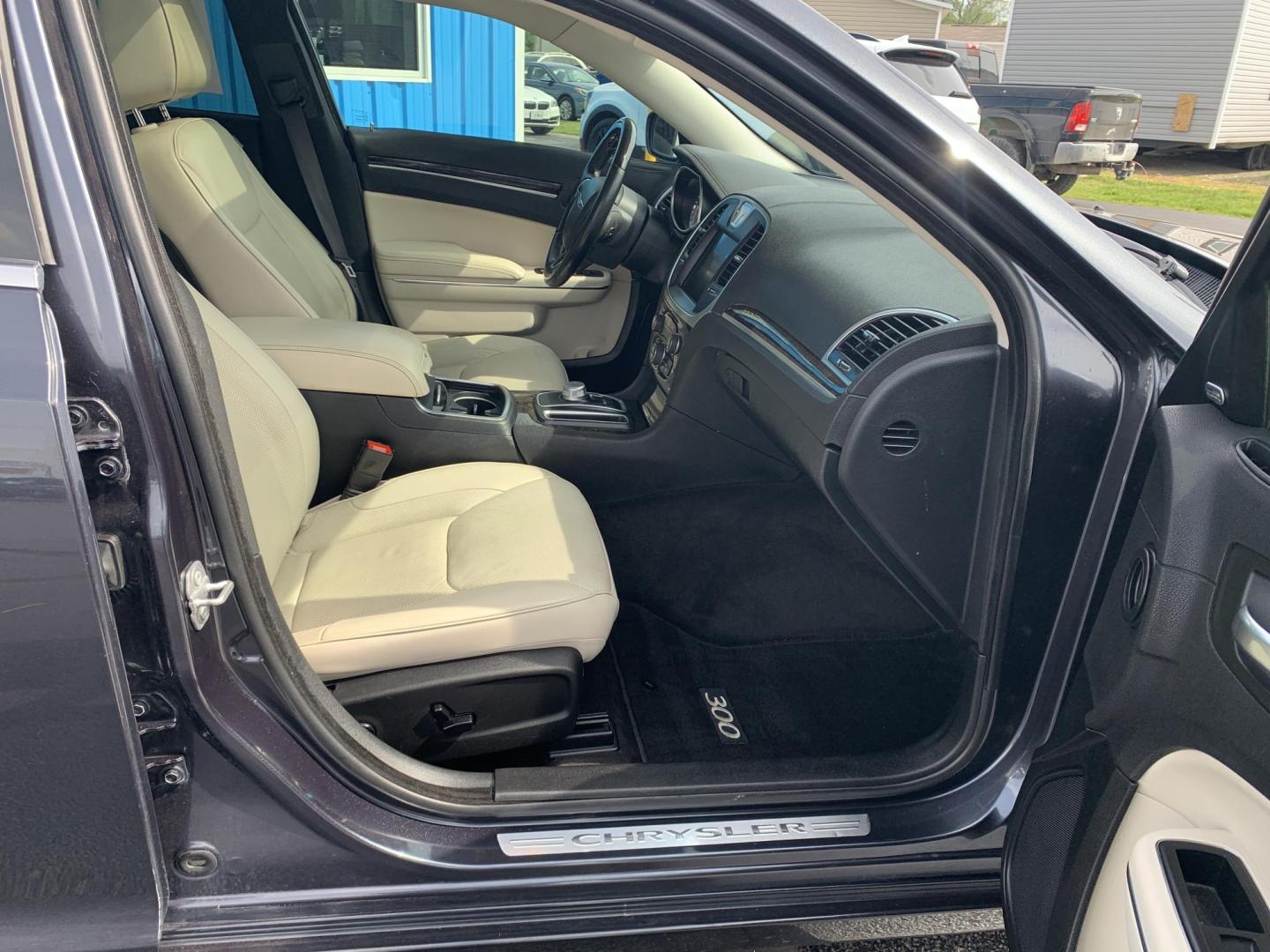 2016 BLUE /TAN Chrysler 300 C AWD (2C3CCAKGXGH) with an 3.6L V6 SOHC 24V engine, Automatic transmission, located at 506 S. Kingshighway, Cape Girardeau, MO, 63703, (573) 235-5000, 37.294991, -89.553635 - 2016 Chrysler 300 C AWD 178,xxx miles Heated Steering Wheel Heated Seats All Wheel Drive Power Seats Sunroof Bluetooth Cruise Power Windows/Locks/Mirrors Remote Start We have financing available and we accept trades! Fill out a credit application on our website or come by today! If you - Photo#11