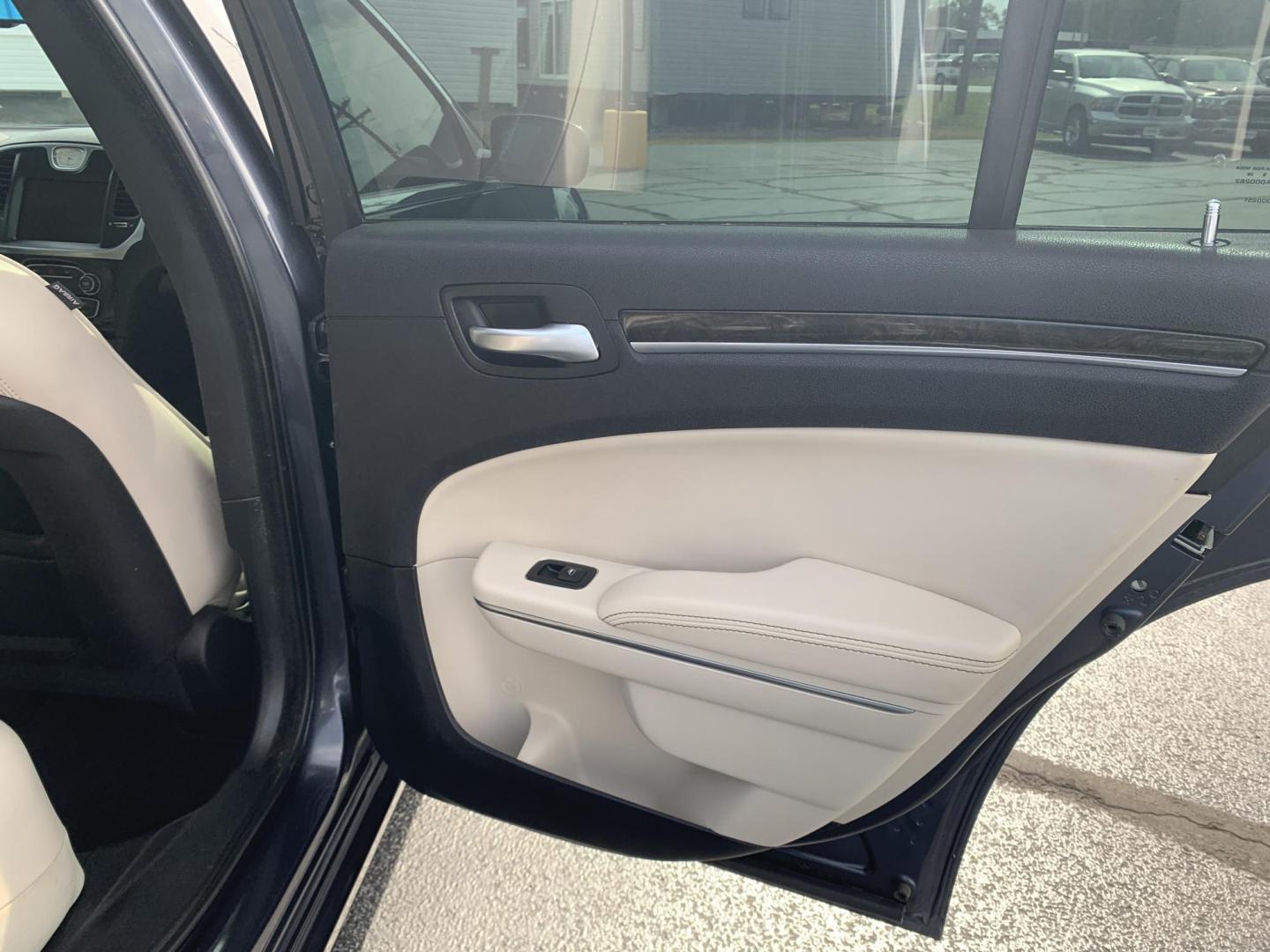 2016 BLUE /TAN Chrysler 300 C AWD (2C3CCAKGXGH) with an 3.6L V6 SOHC 24V engine, Automatic transmission, located at 506 S. Kingshighway, Cape Girardeau, MO, 63703, (573) 235-5000, 37.294991, -89.553635 - 2016 Chrysler 300 C AWD 178,xxx miles Heated Steering Wheel Heated Seats All Wheel Drive Power Seats Sunroof Bluetooth Cruise Power Windows/Locks/Mirrors Remote Start We have financing available and we accept trades! Fill out a credit application on our website or come by today! If you - Photo#12