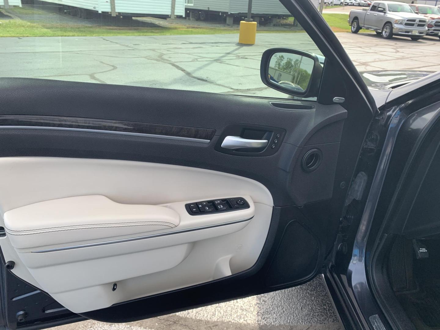 2016 BLUE /TAN Chrysler 300 C AWD (2C3CCAKGXGH) with an 3.6L V6 SOHC 24V engine, Automatic transmission, located at 506 S. Kingshighway, Cape Girardeau, MO, 63703, (573) 235-5000, 37.294991, -89.553635 - 2016 Chrysler 300 C AWD 178,xxx miles Heated Steering Wheel Heated Seats All Wheel Drive Power Seats Sunroof Bluetooth Cruise Power Windows/Locks/Mirrors Remote Start We have financing available and we accept trades! Fill out a credit application on our website or come by today! If you - Photo#18