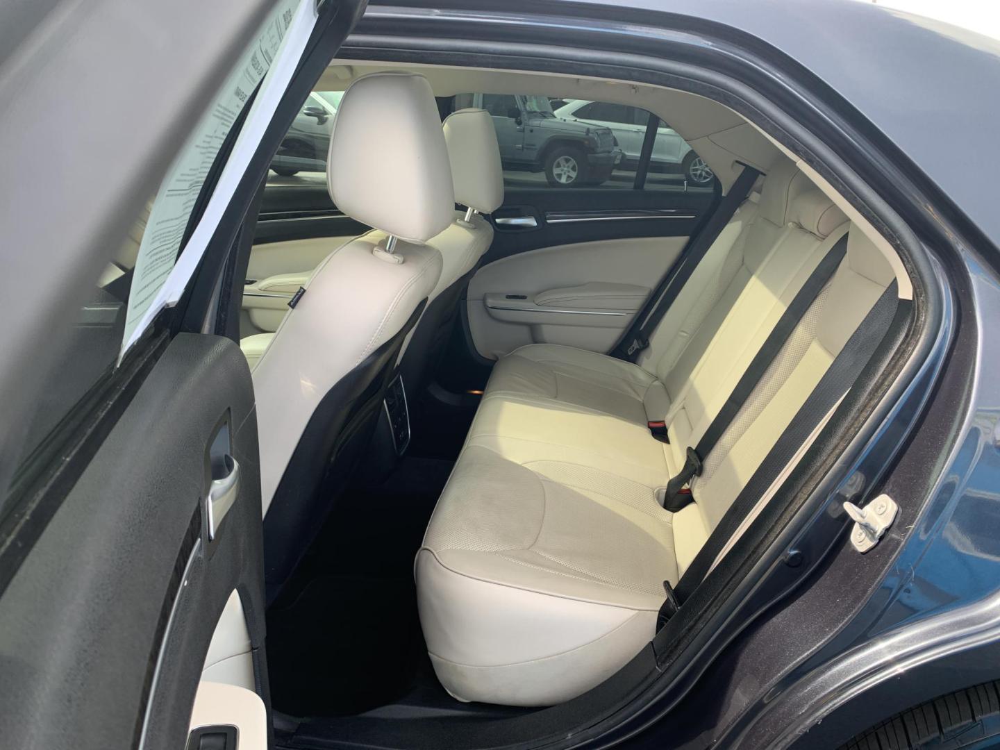 2016 BLUE /TAN Chrysler 300 C AWD (2C3CCAKGXGH) with an 3.6L V6 SOHC 24V engine, Automatic transmission, located at 506 S. Kingshighway, Cape Girardeau, MO, 63703, (573) 235-5000, 37.294991, -89.553635 - 2016 Chrysler 300 C AWD 178,xxx miles Heated Steering Wheel Heated Seats All Wheel Drive Power Seats Sunroof Bluetooth Cruise Power Windows/Locks/Mirrors Remote Start We have financing available and we accept trades! Fill out a credit application on our website or come by today! If you - Photo#17