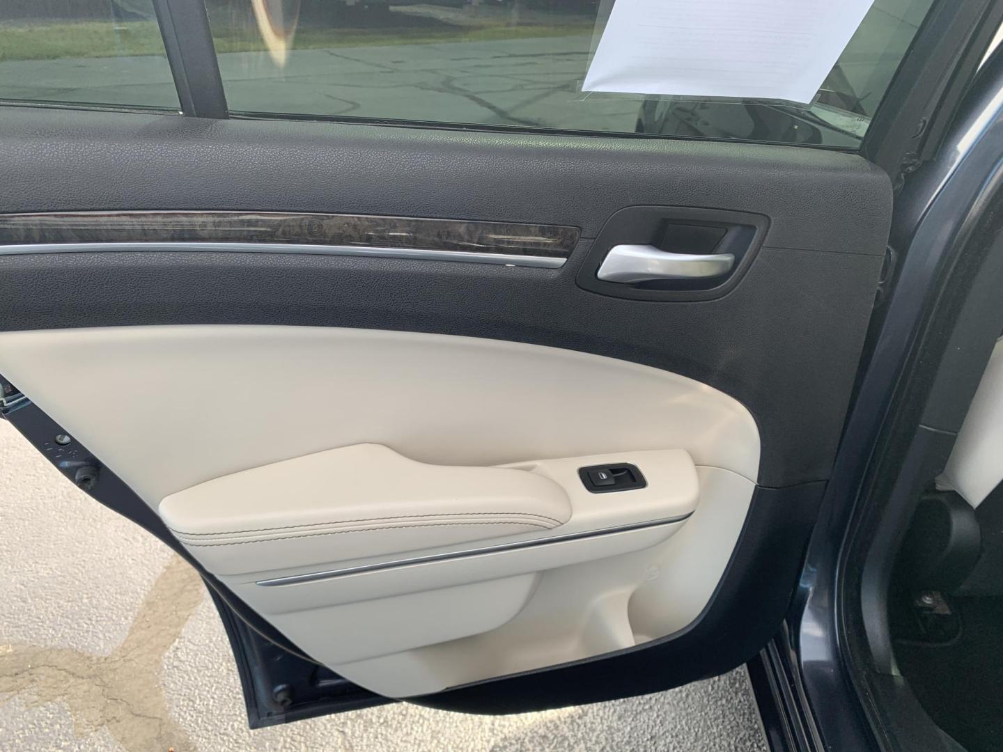 2016 BLUE /TAN Chrysler 300 C AWD (2C3CCAKGXGH) with an 3.6L V6 SOHC 24V engine, Automatic transmission, located at 506 S. Kingshighway, Cape Girardeau, MO, 63703, (573) 235-5000, 37.294991, -89.553635 - 2016 Chrysler 300 C AWD 178,xxx miles Heated Steering Wheel Heated Seats All Wheel Drive Power Seats Sunroof Bluetooth Cruise Power Windows/Locks/Mirrors Remote Start We have financing available and we accept trades! Fill out a credit application on our website or come by today! If you - Photo#16