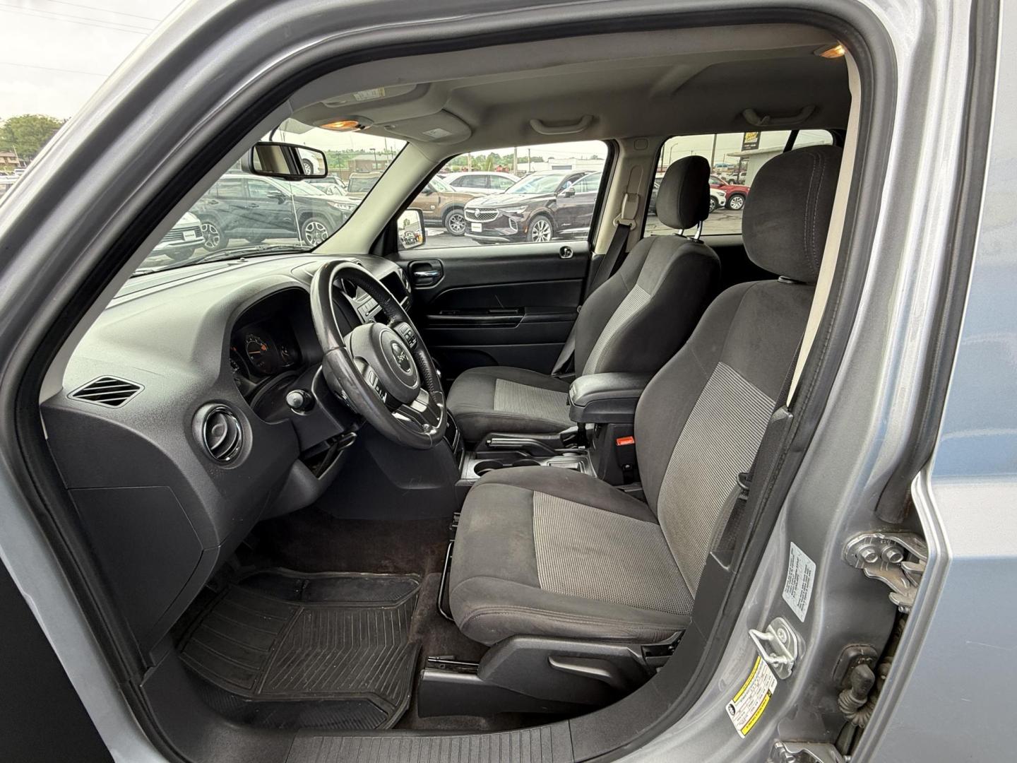 2017 SILVER /Black Jeep Patriot Latitude 2WD (1C4NJPFB5HD) with an 2.4L L4 engine, Automatic transmission, located at 506 S. Kingshighway, Cape Girardeau, MO, 63703, (573) 235-5000, 37.294991, -89.553635 - 2017 Jeep Patriot Latitude 2WD 129xxx miles Front Wheel Drive 2.4L 4 Cyl. Automatic Heated Seats Bluetooth Remote Start Cruise Power Windows/Locks/Mirrors We have financing available and we accept trades! Fill out a credit application on our website or come by today! If you have any quest - Photo#13