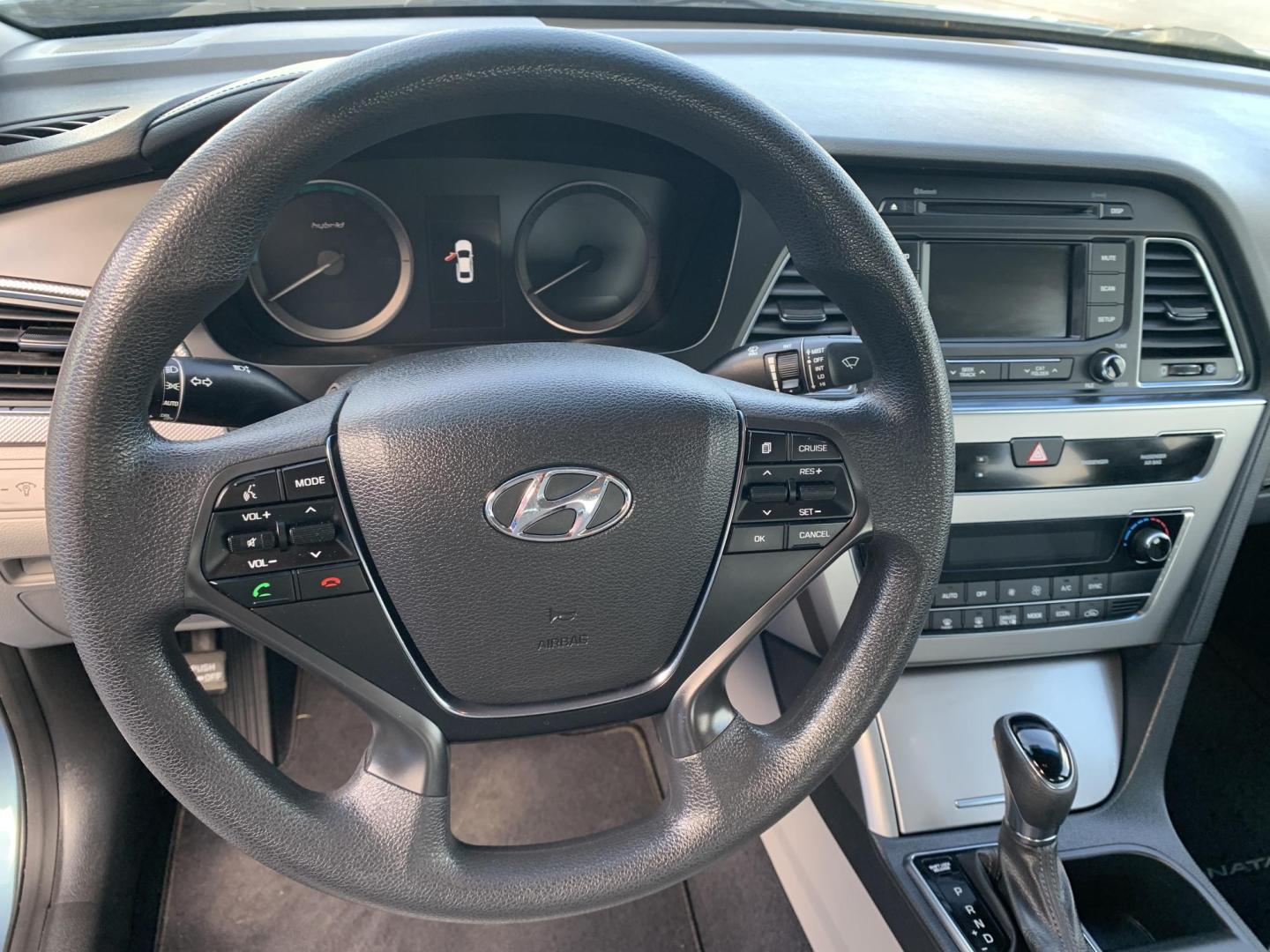 2016 BLUE /GRAY Hyundai Sonata Hybrid Base (KMHE24L14GA) with an 2.0L L4 DOHC 16V HYBRID engine, Automatic transmission, located at 506 S. Kingshighway, Cape Girardeau, MO, 63703, (573) 235-5000, 37.294991, -89.553635 - 2016 Hyundai Sonata Hybrid Base 134,xxx miles Front Wheel Drive Cloth Seats Power Windows Rear Window Defroster Power Outlet Steering Wheel Controls Tilt Steering Wheel Alarm System Bluetooth Wireless Cruise Control Hands Free Phone Remote Keyless Entry Proximity Sensing Keyless Entry - Photo#23